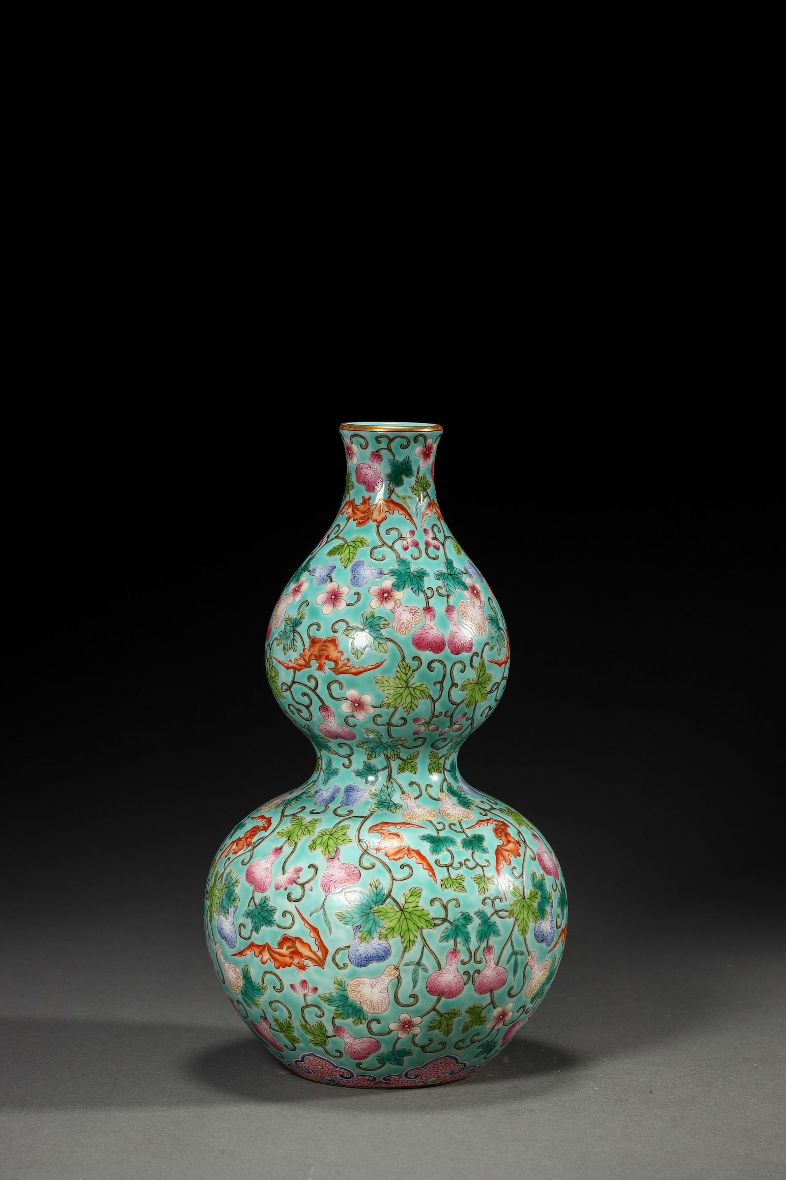 TURQUOISE GROUND BAT AND GOURD VASE: Turquoise ground bat and gourd vase.Dimensions: Height: 28 cm, Width: 15.5 cm.