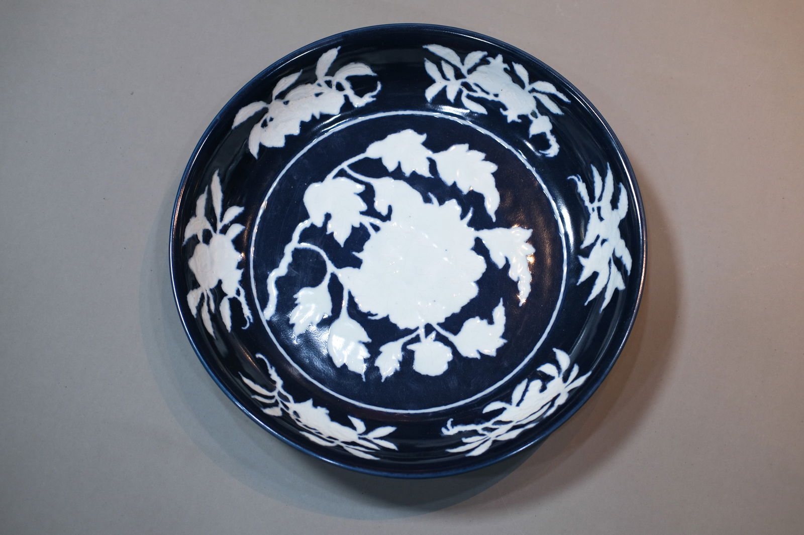 SACRIFICIAL BLUE GLAZE PEONY DISH: Sacrificial blue glaze peony dish.Dimensions: Diameter: 40.3 cm.