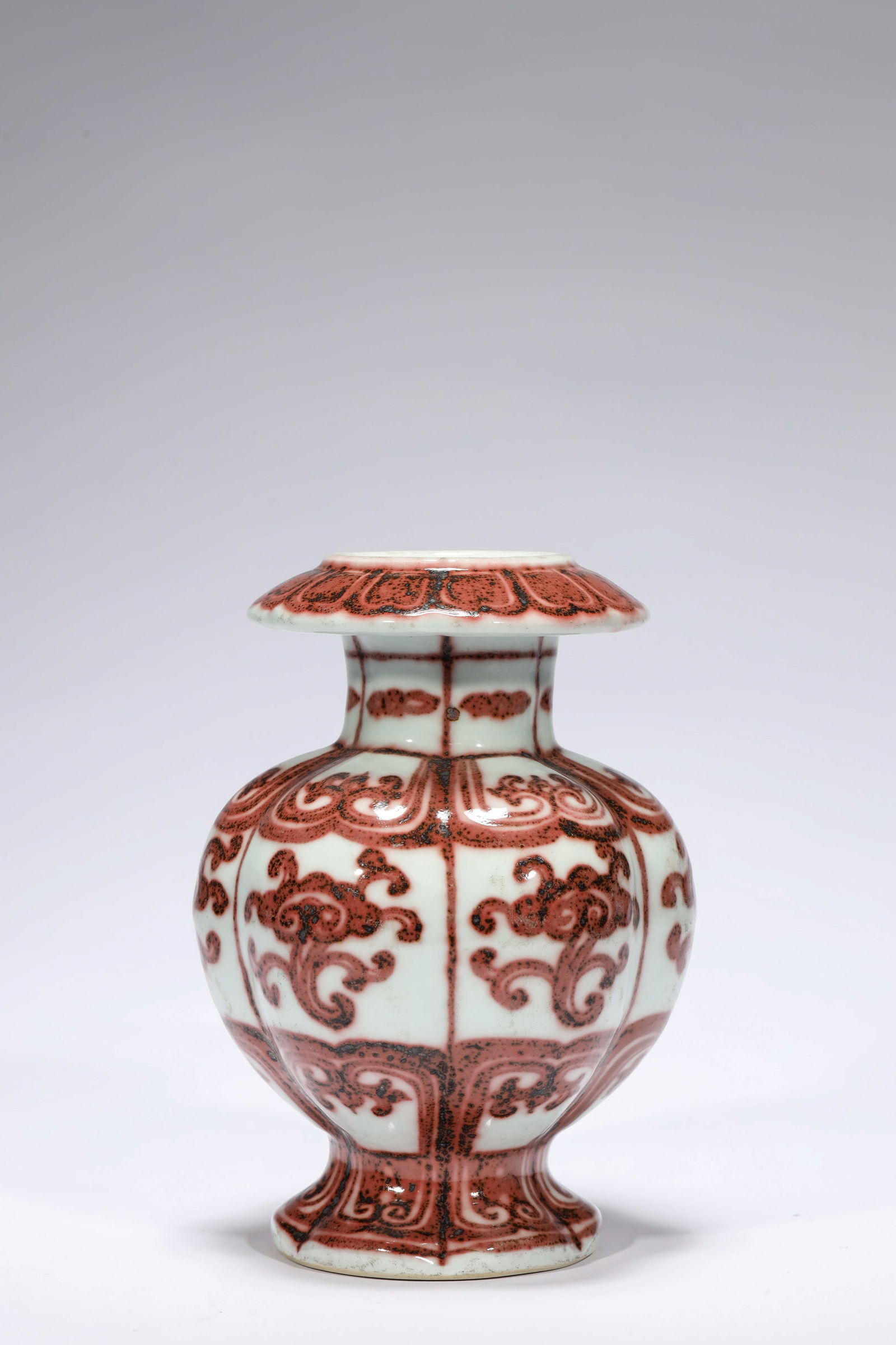 COPPER RED GLAZE LINGZHI LOBED ZUN: Copper red glaze lingzhi lobed zun.Dimensions: Height: 19 cm, Width: 13.5 cm.