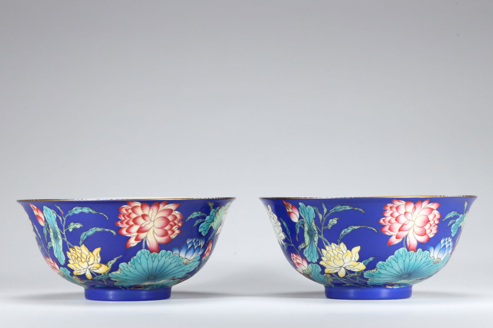 BLUE GROUND FALANGCAI LOTUS POND BOWLS: Blue ground falangcai lotus pond bowls.Dimensions: Width: 15 cm, Height: 7 cm.
