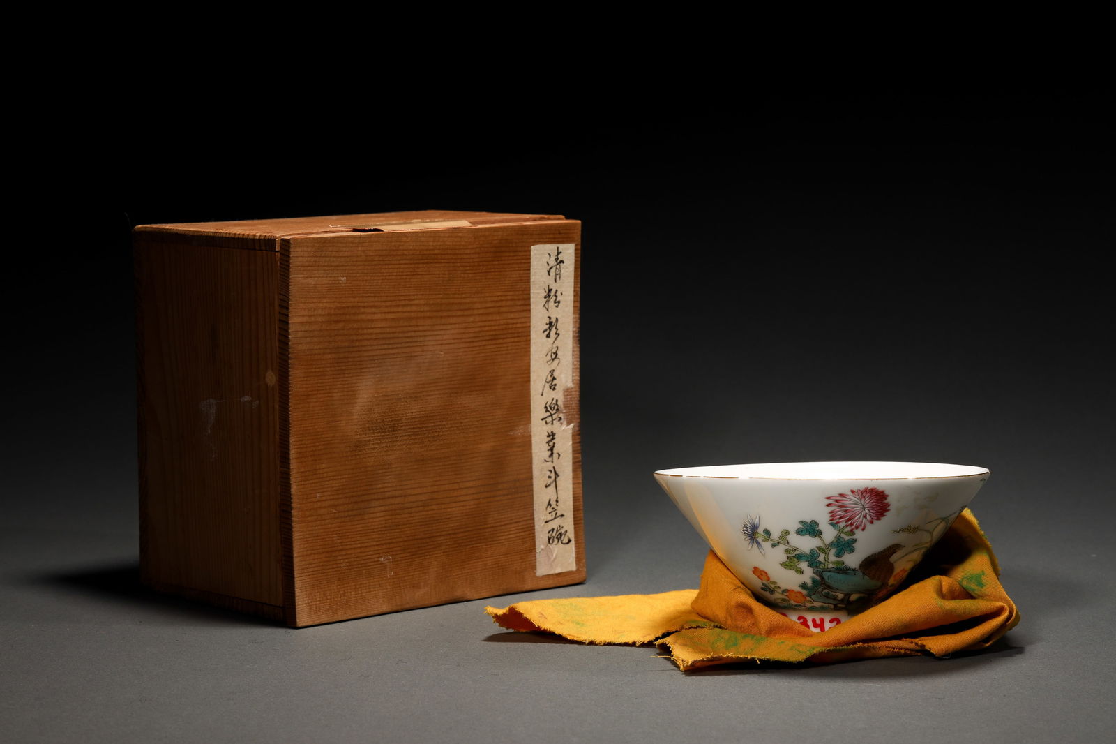 FAMILLE ROSE FLOWER AND BIRD CONICAL BOWL: Famille rose flower and bird conical bowl. Dimensions: Height: 6.4 cm, Width: 13.8 cm.