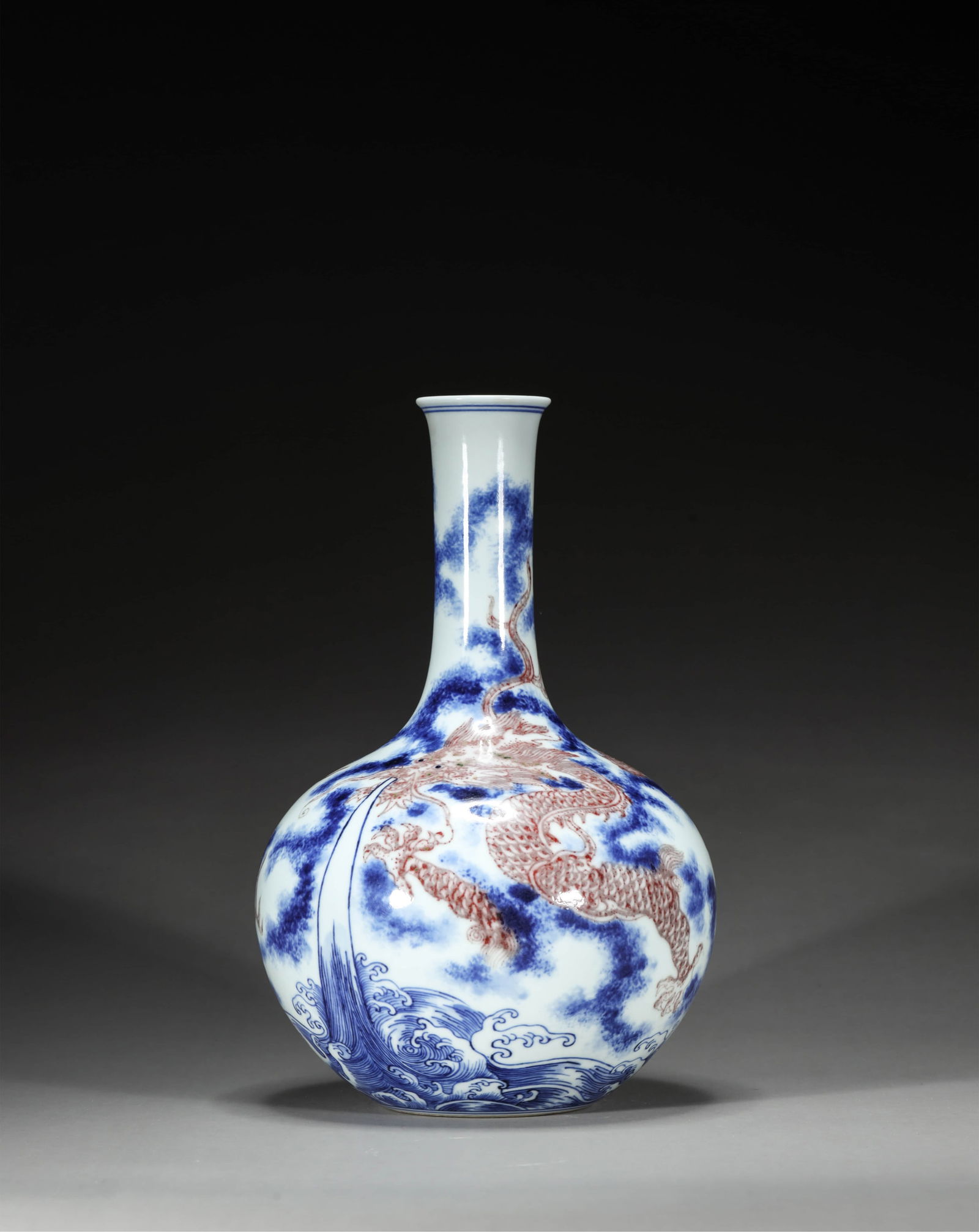 COPPER RED GLAZE AND UNDERGLAZE BLUE DRAGON TIANQIUPING VASE (1 of 7)