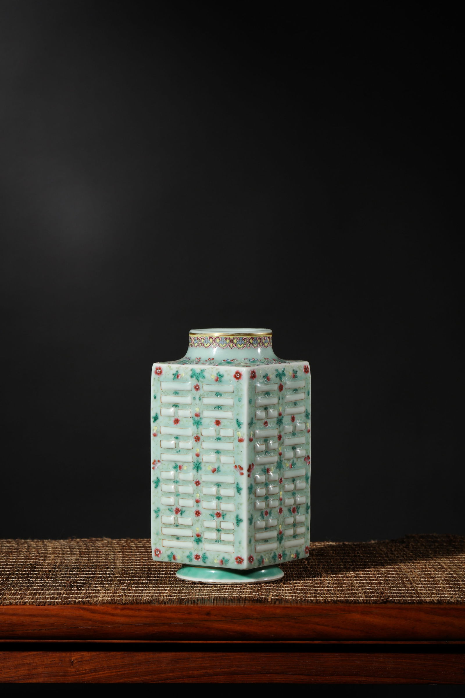 CELADON GROUND FAMILLE ROSE EIGHT TRIGRAM CONG-FORM VASE: Celadon ground famille rose Eight Trigram cong-form vase. Dimensions: Height: 21 cm, Width: 9.7 cm.