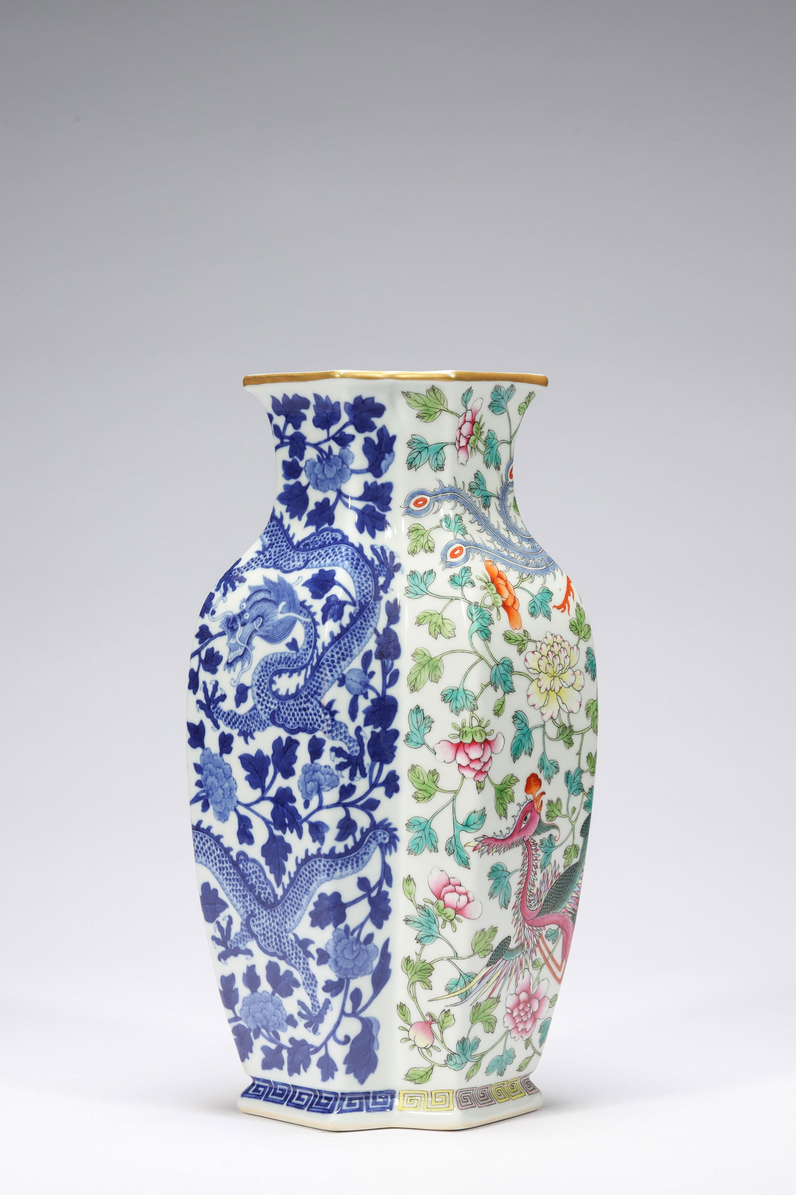 BLUE AND WHITE FAMILLE ROSE DRAGON AND PHOENIX CONJOINED DOUBLE-VASE: Blue and white famille rose dragon and phoenix conjoined double-vase. Dimensions: Height: 30.6 cm, Width: 17 cm.