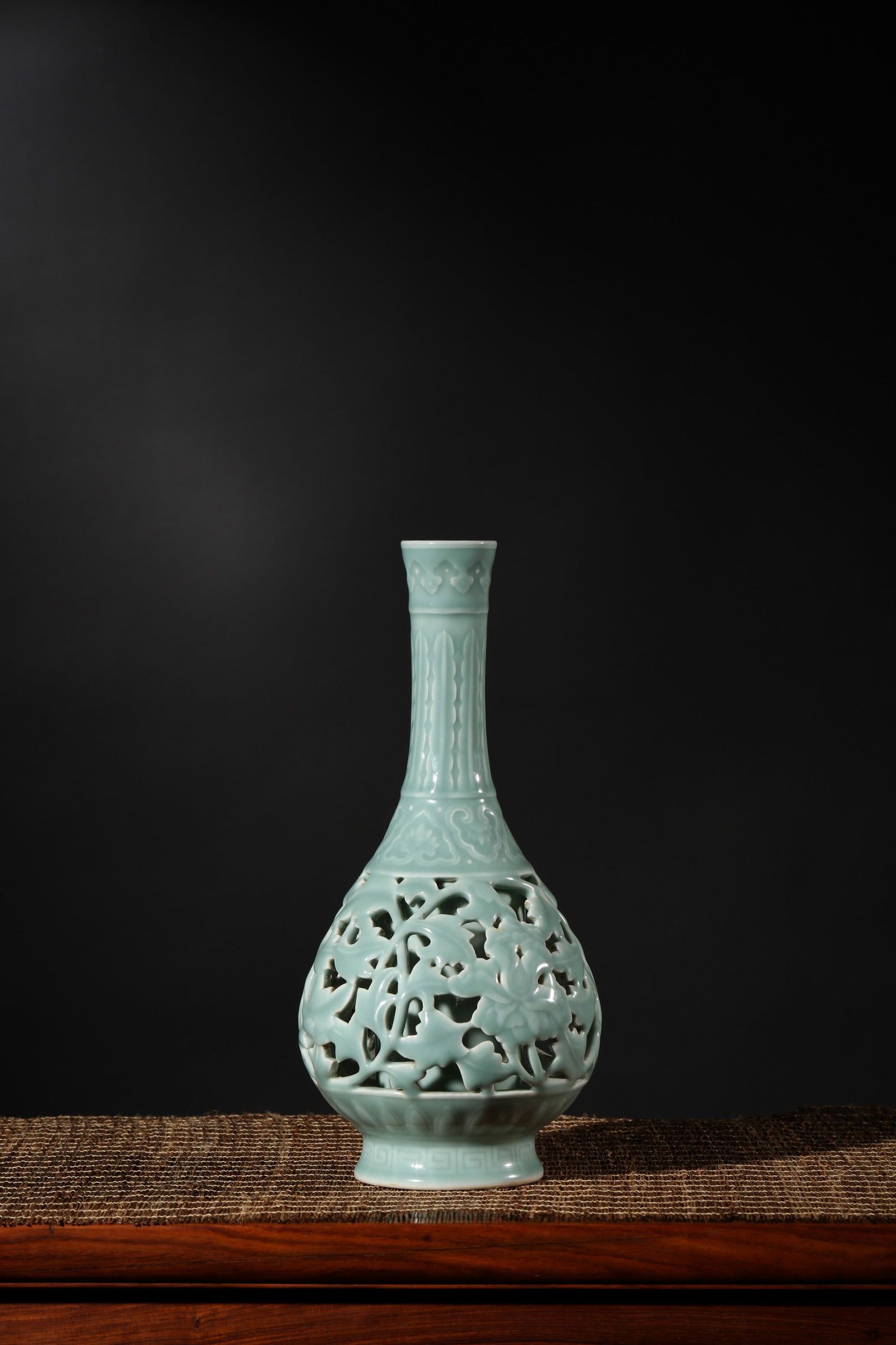 OPENWORK CELADON GLAZE FLOWER VASE: Openwork celadon glaze flower vase. Dimensions: Height: 31.5 cm, Width: 15 cm.