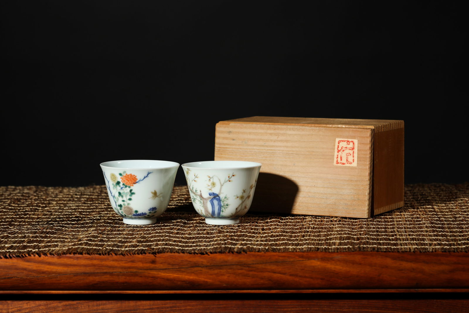 TWO UNDERGLAZE AND FAMILLE ROSE FLORIST TEACUPS: Two underglaze and famille rose florist teacups. Dimensions: Height: 4.6 cm, Diameter: 6.2 cm.