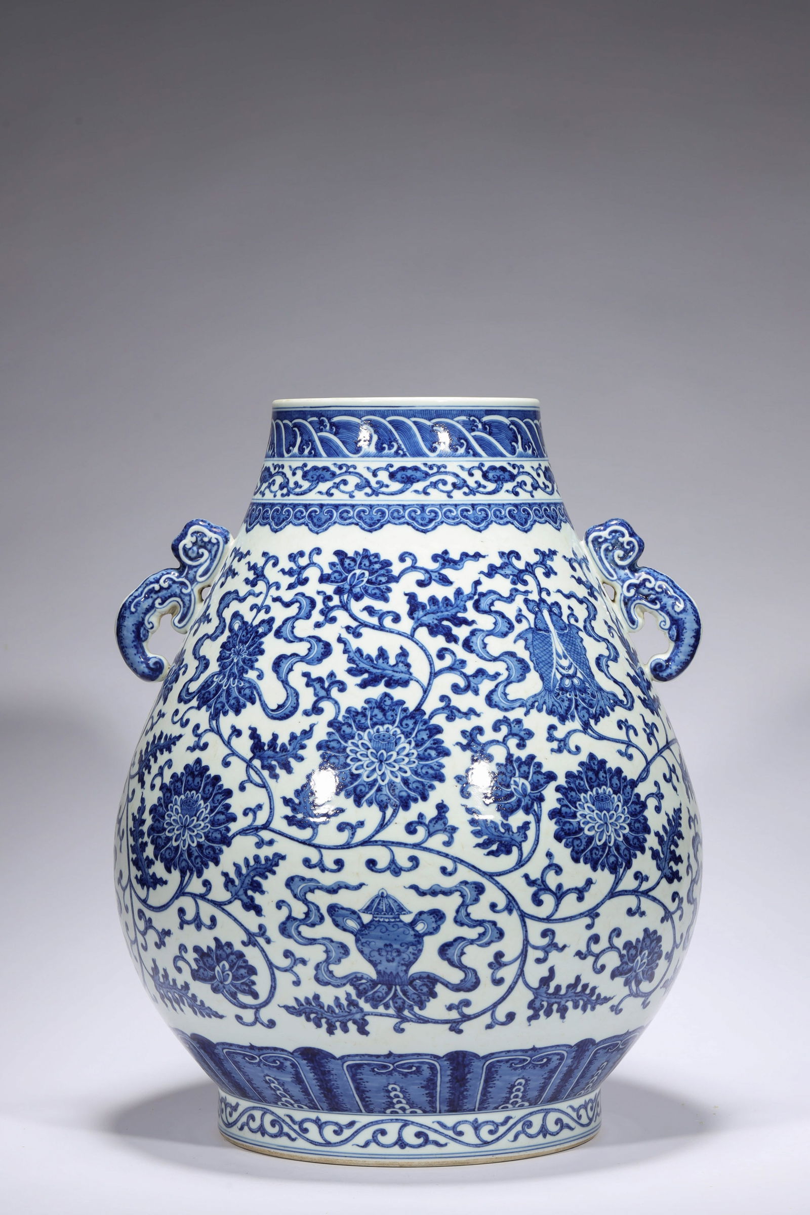 LARGE BLUE AND WHITE LOTUS DOUBLE-EARED ZUN: Large blue and white lotus double-eared zun.Dimensions: Height: 47.3 cm, Width: 38 cm.