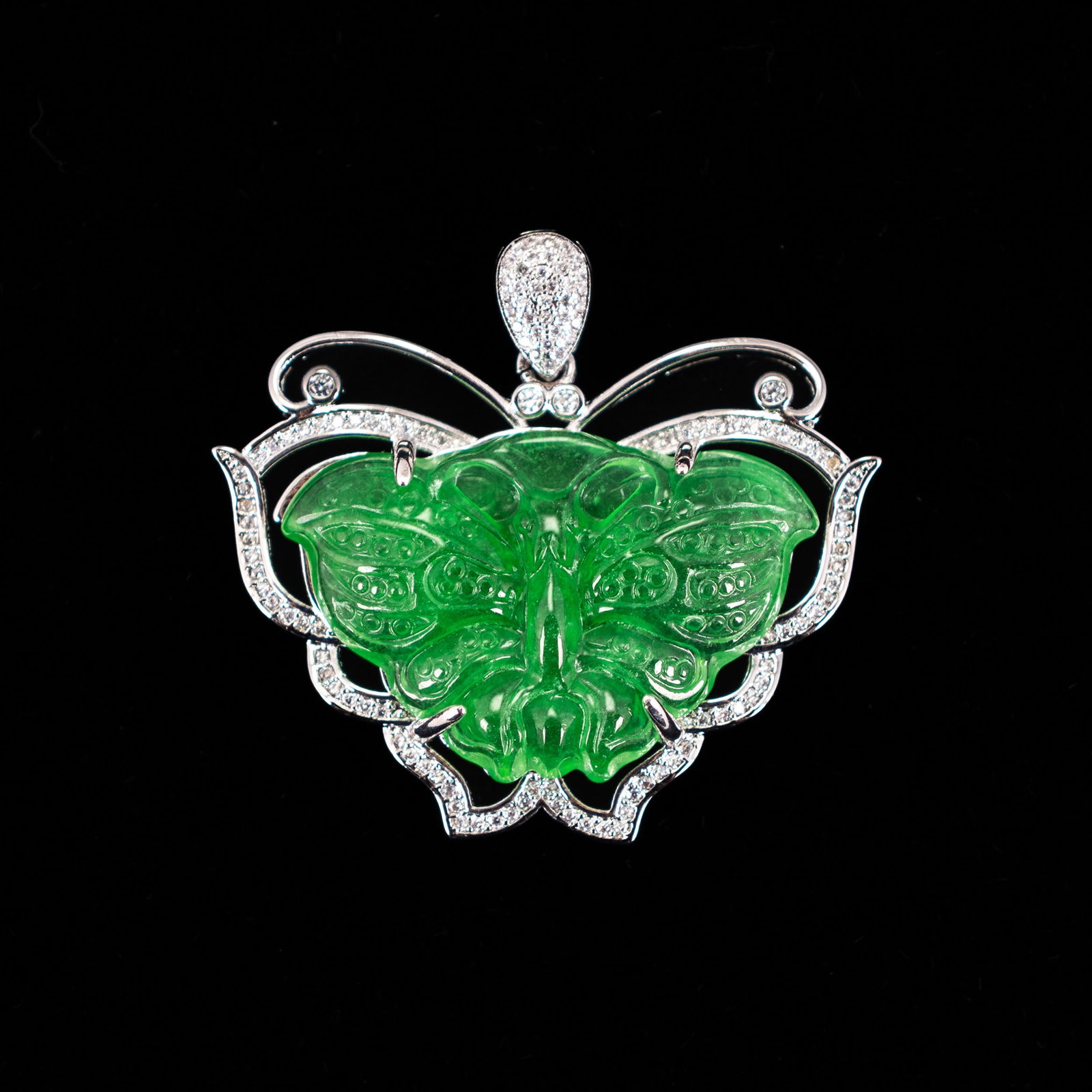 A JADEITE PENDANT OF A BUTTERFLY (1 of 4)