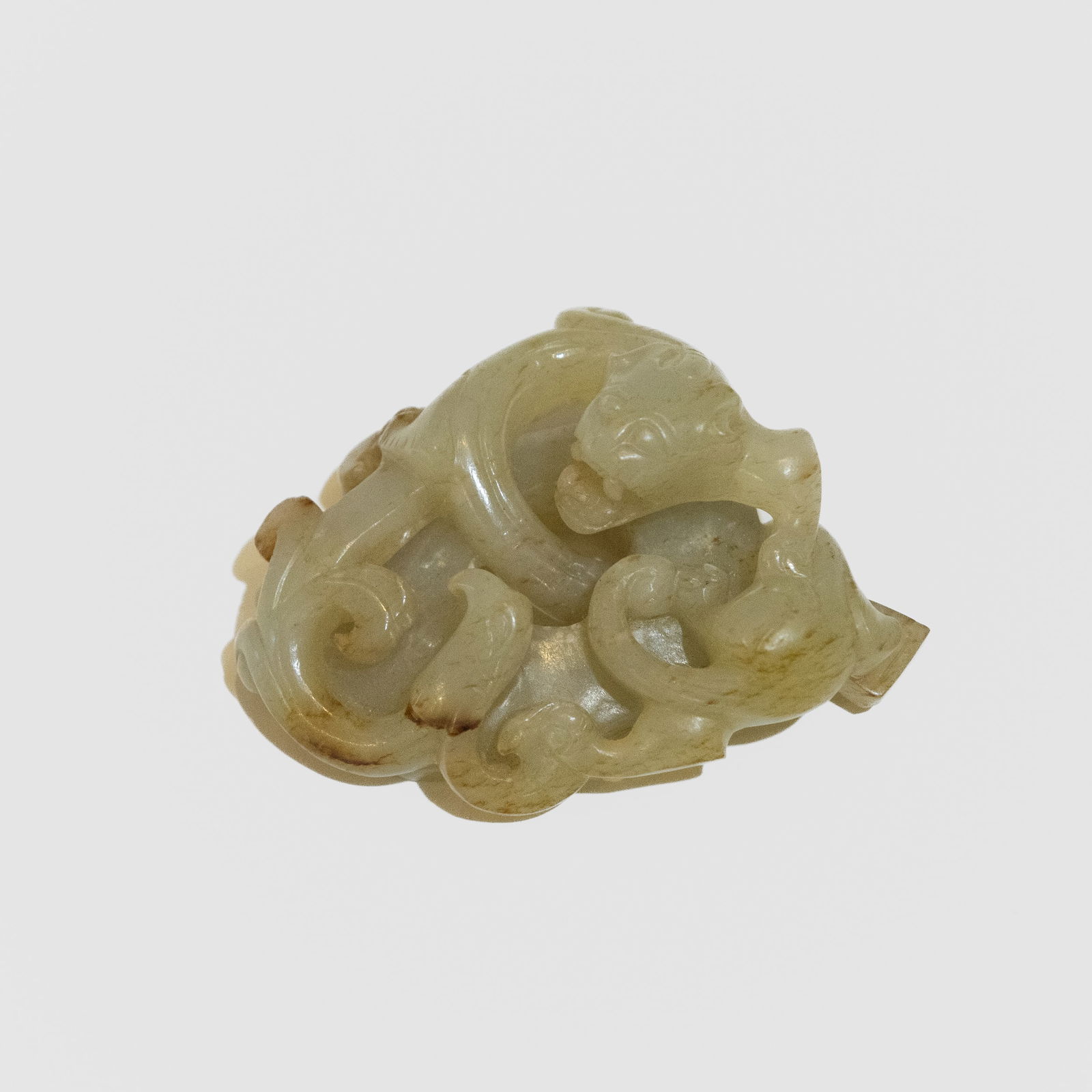 A CHINESE JADE CARVING: A Chinese Jade Carving. H 2.5 x 6 x 5 cm