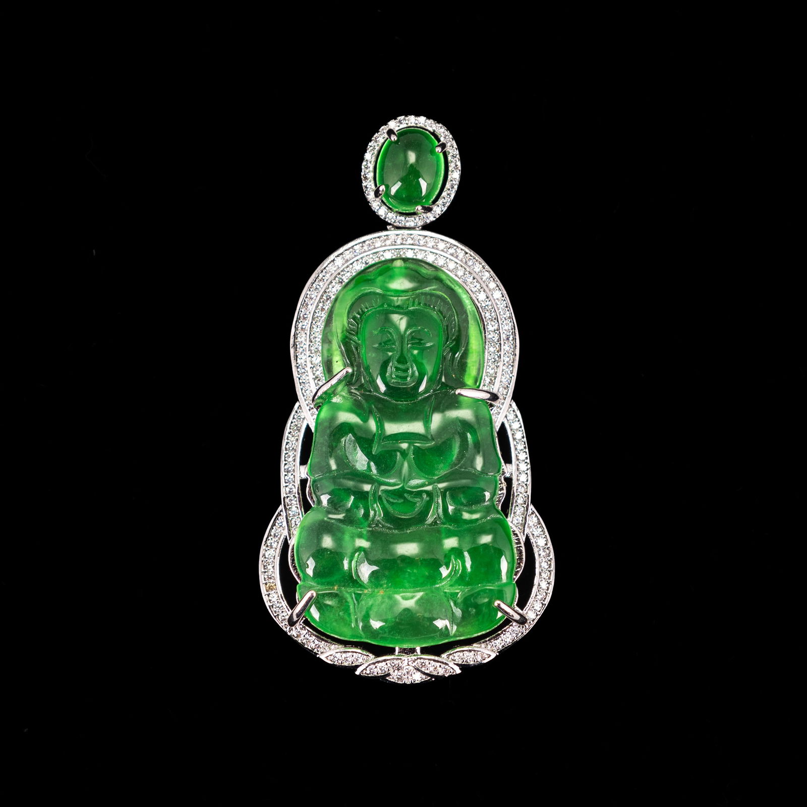 A JADEITE PENDANT IN BUDDHA SHAPE (1 of 4)