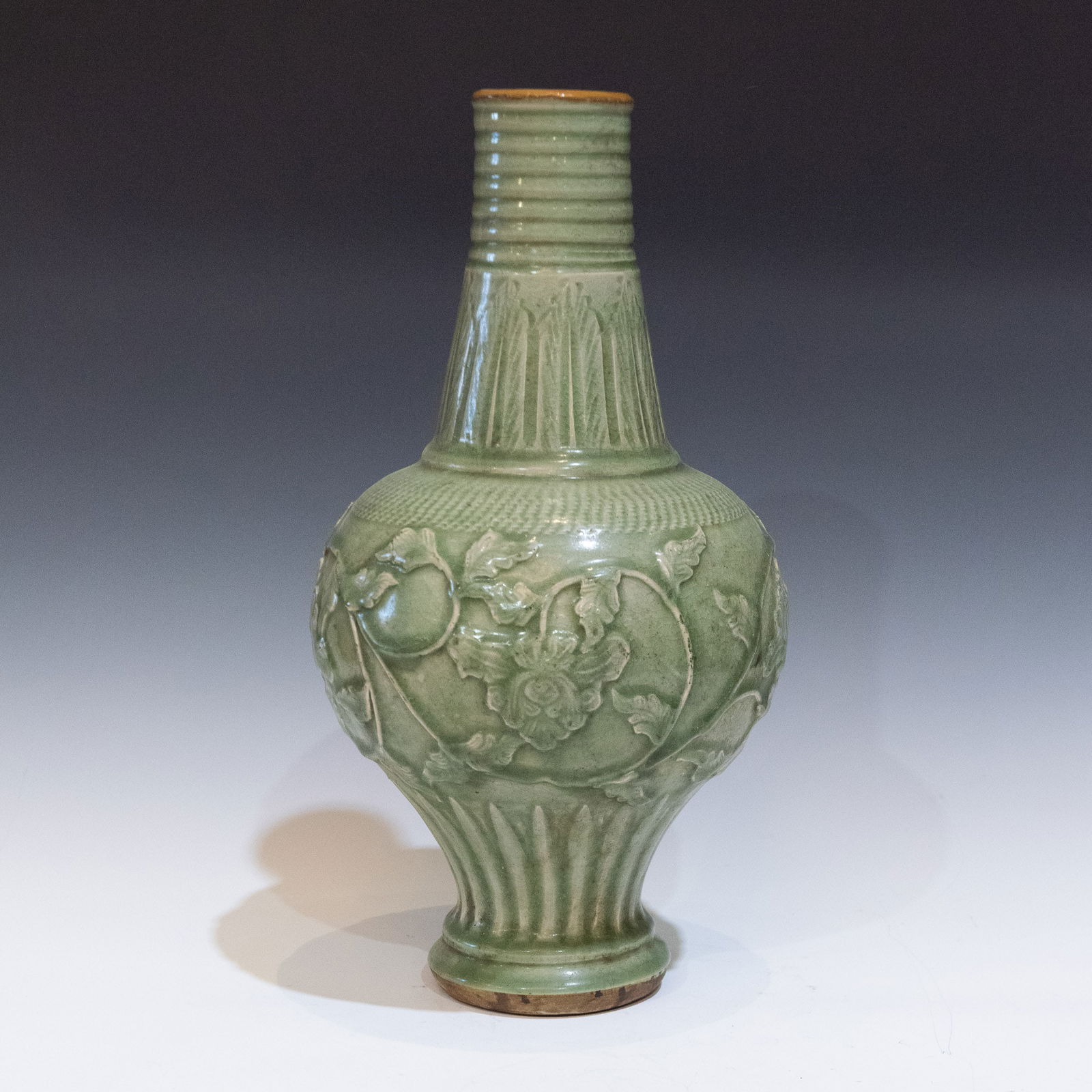 A CHINESE CARVED CELADON VASE (1 of 8)