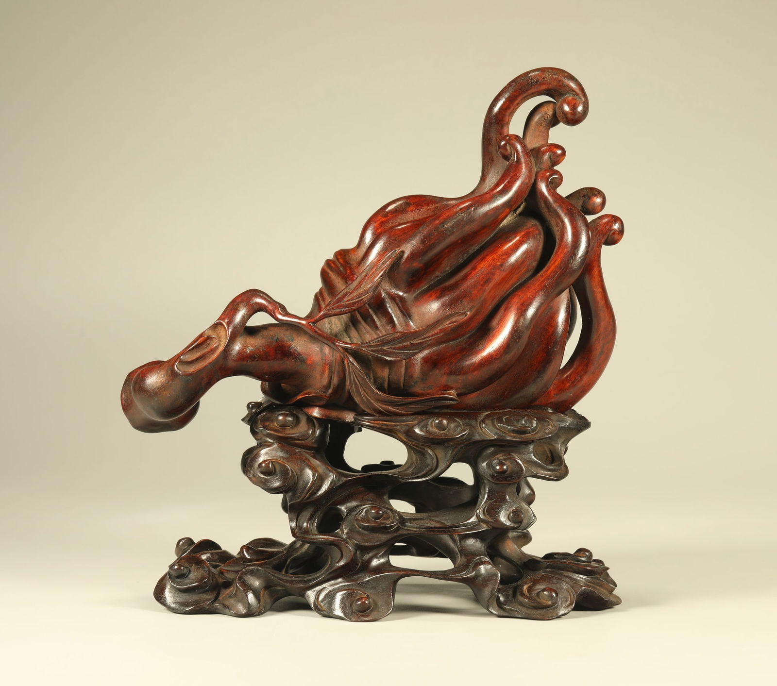 A CARVED HUANGHUALI ORNAMENT (1 of 6)