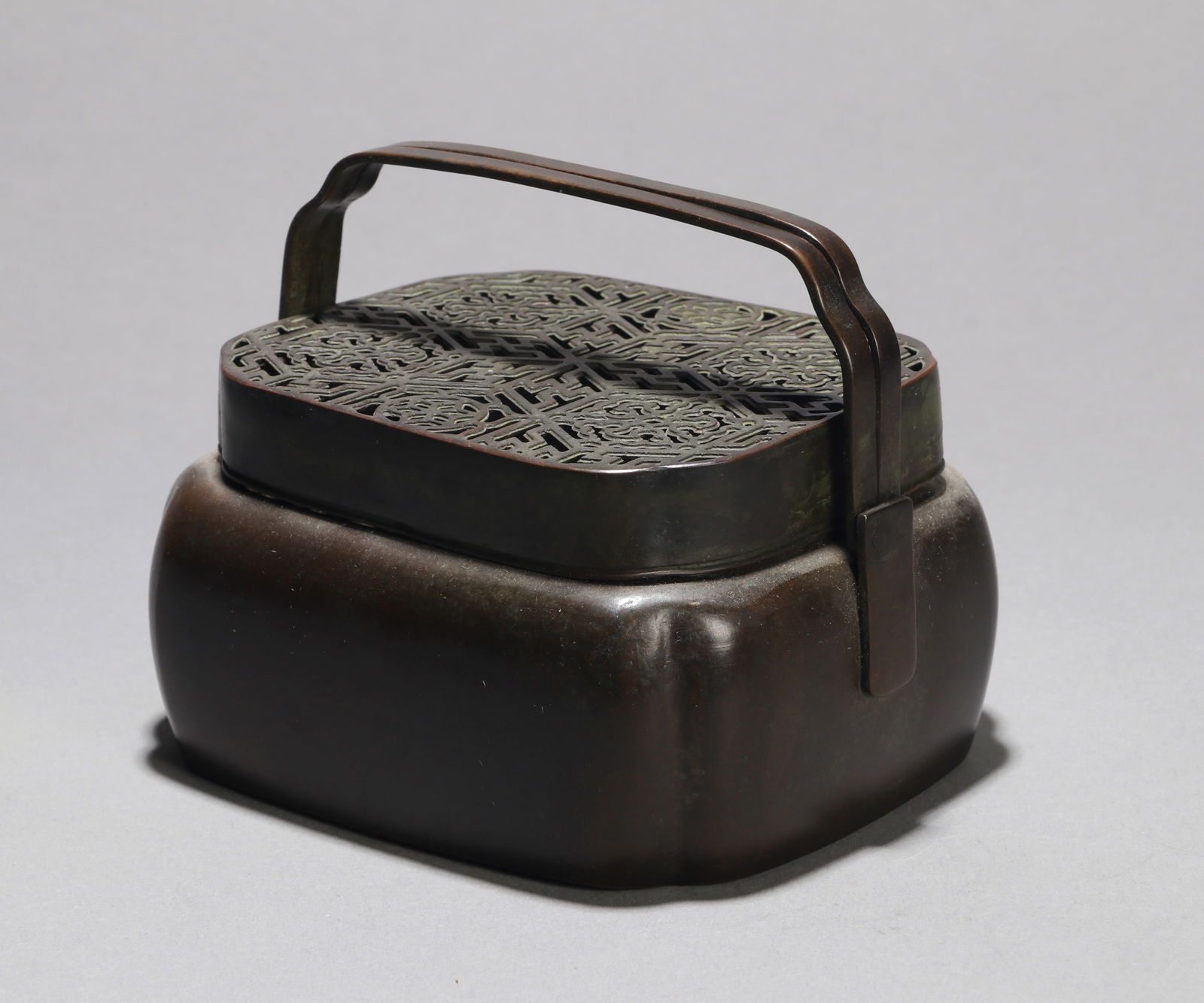 A BRONZE HAND WARMER (1 of 6)