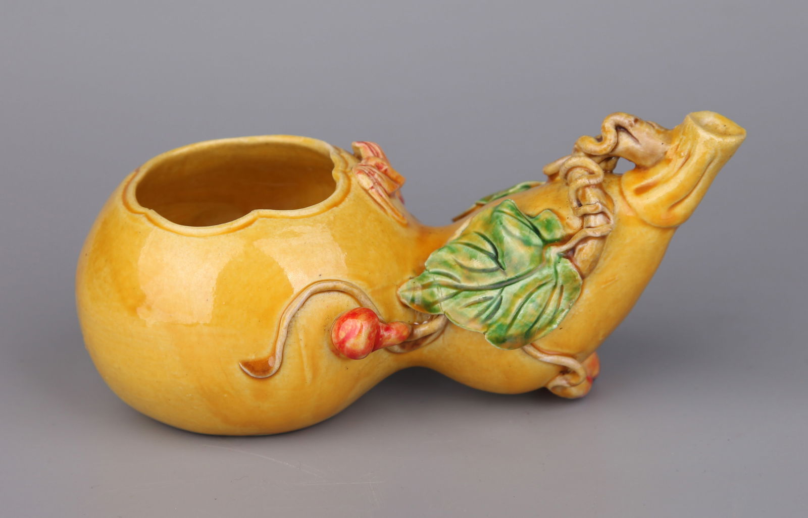 A YELLOW-GLAZED DROPPER - 4