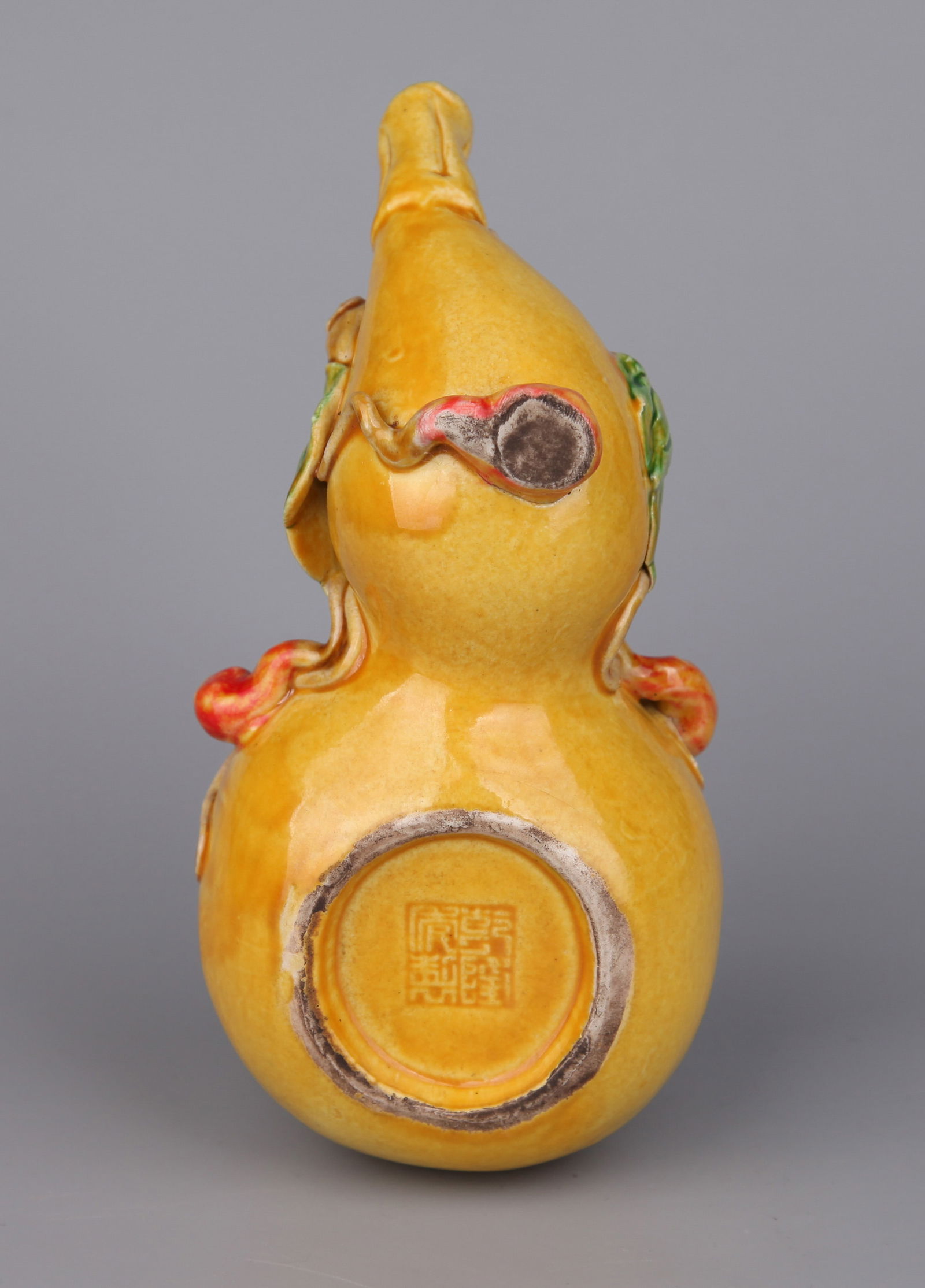 A YELLOW-GLAZED DROPPER - 6