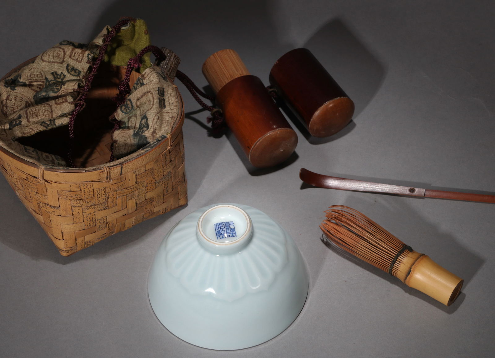 A CELADON-GLAZED CUP - 3