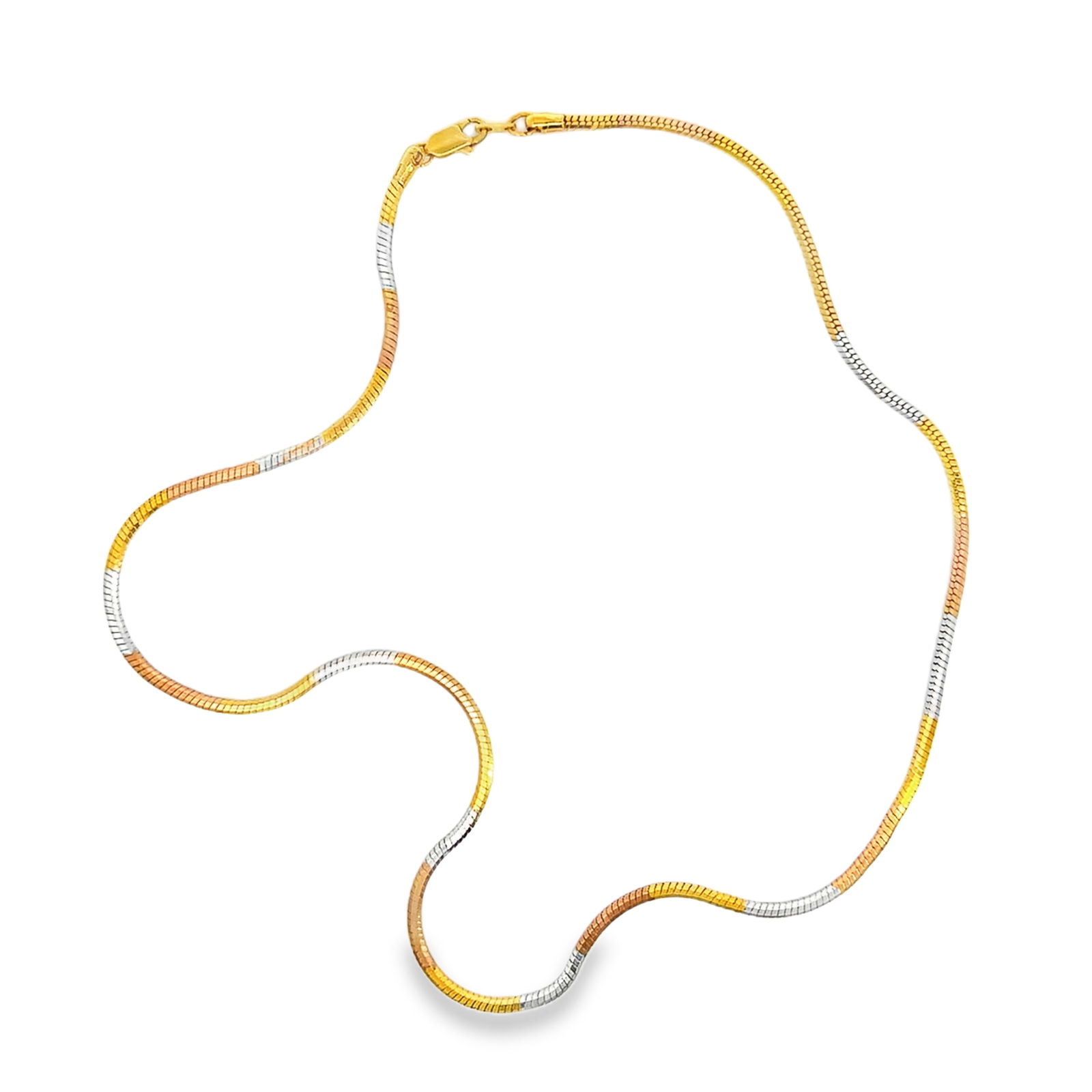 AN ITALIAN MONET TRI-TONE SNAKE CHAIN 18K NECKLACE: An Italian Monet tri-tone snake chain 18K necklace.Length 45 cm; Weight 16 g.