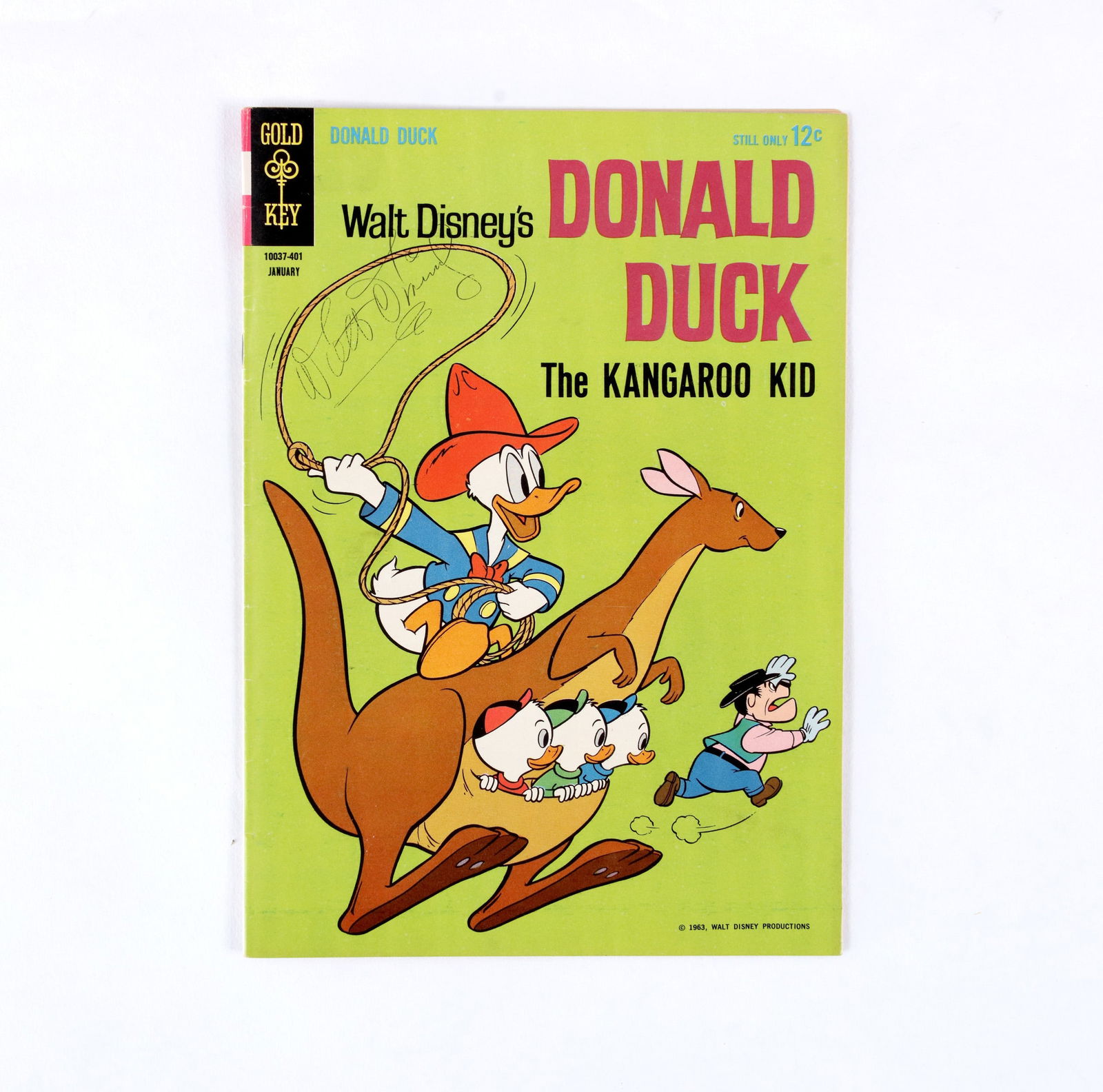 DONALD DUCK GOLD KEY COMIC BOOK (1963) BEARING SIGNATURE: A vintage Gold Key comic book featuring Donald Duck. The cover bears a signature reading 'Walt Disney' in dark ink. Note: Walt Disney is one of the most influential cultural figures of the 20th centur