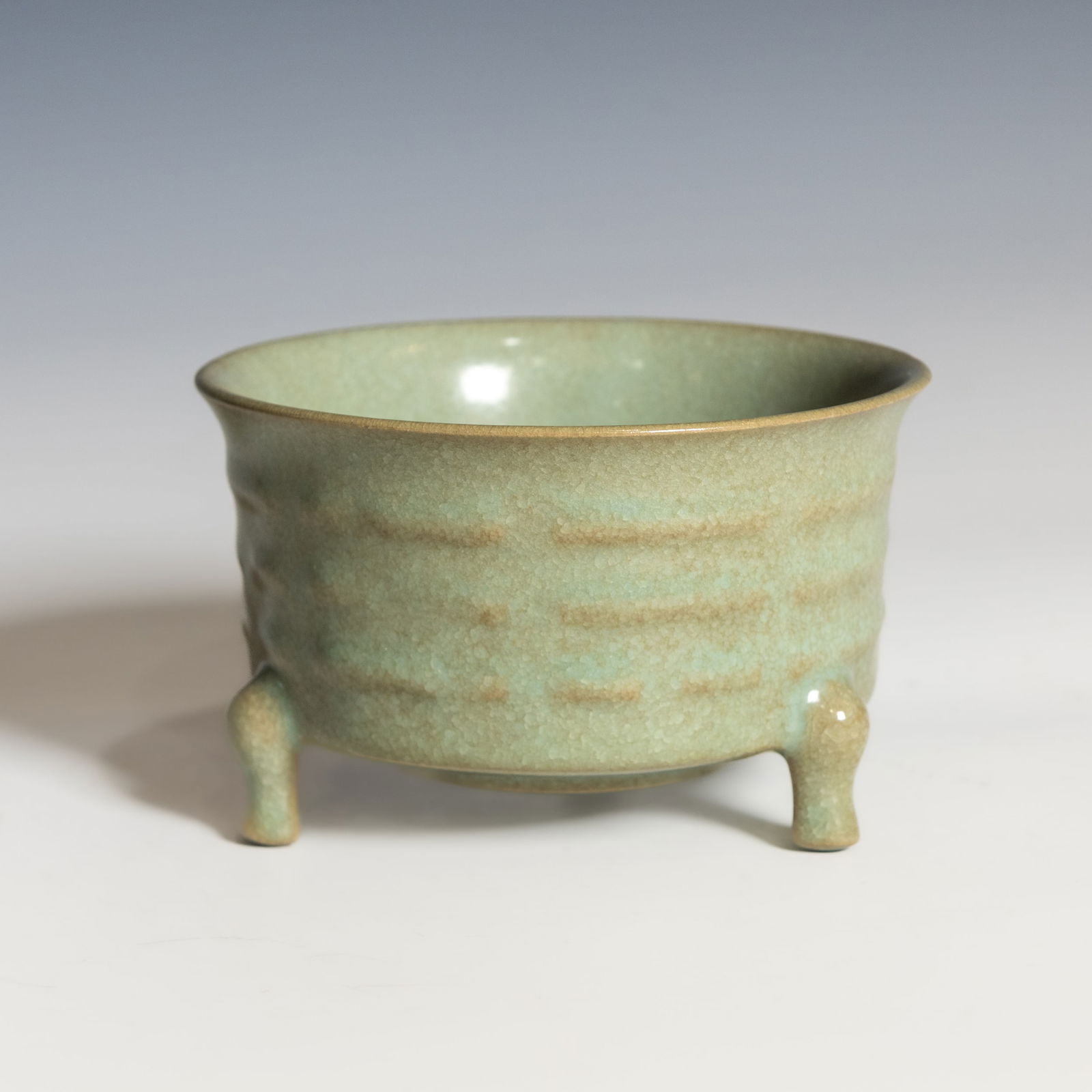A CHINESE CELADON TRIPOD CENSER (1 of 6)
