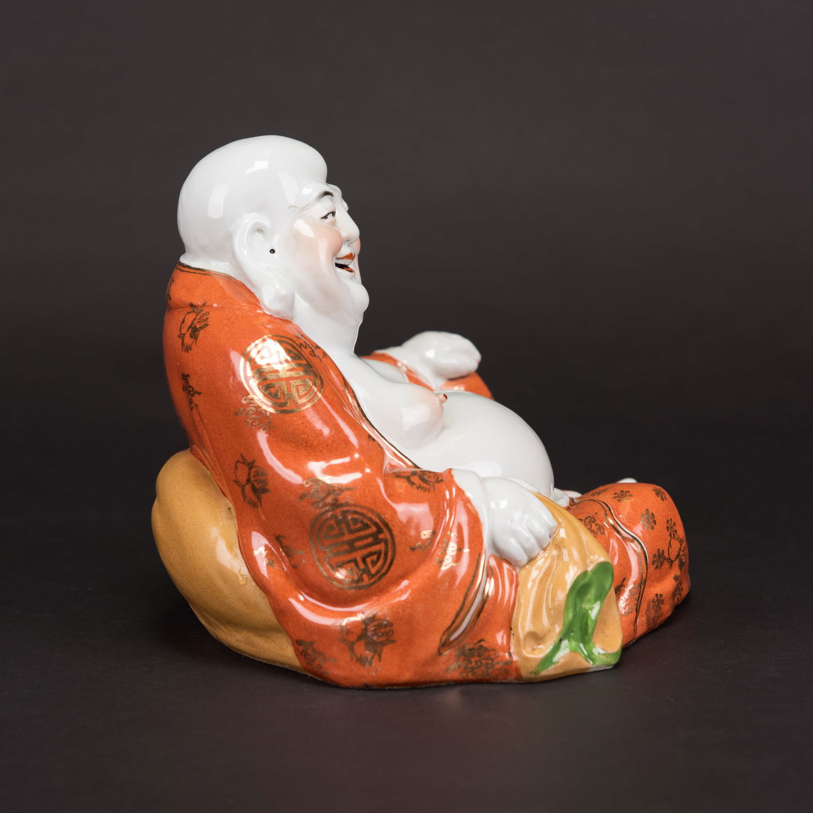 A SMILING BUDDHA STATUE - 2