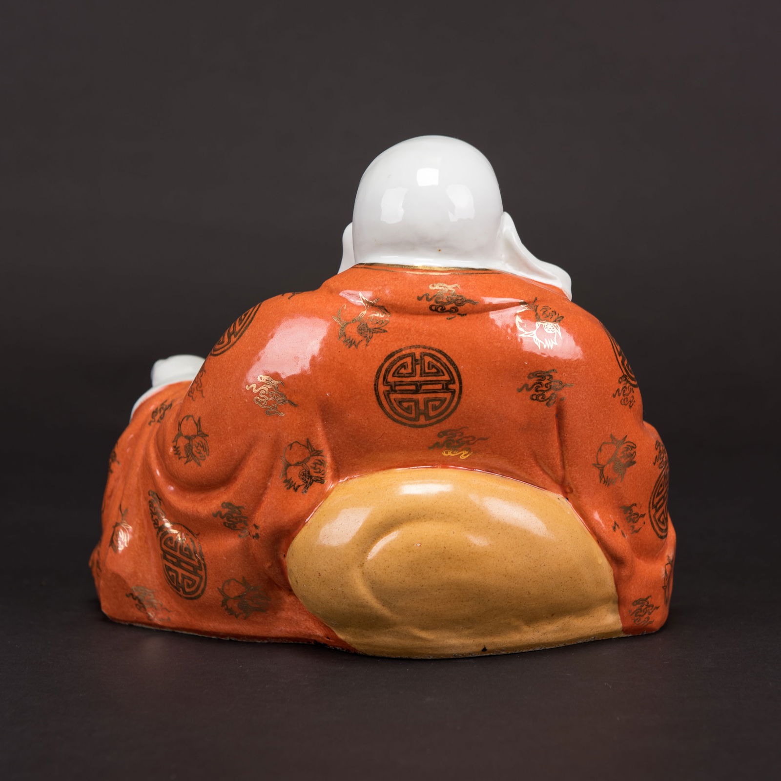 A SMILING BUDDHA STATUE - 3