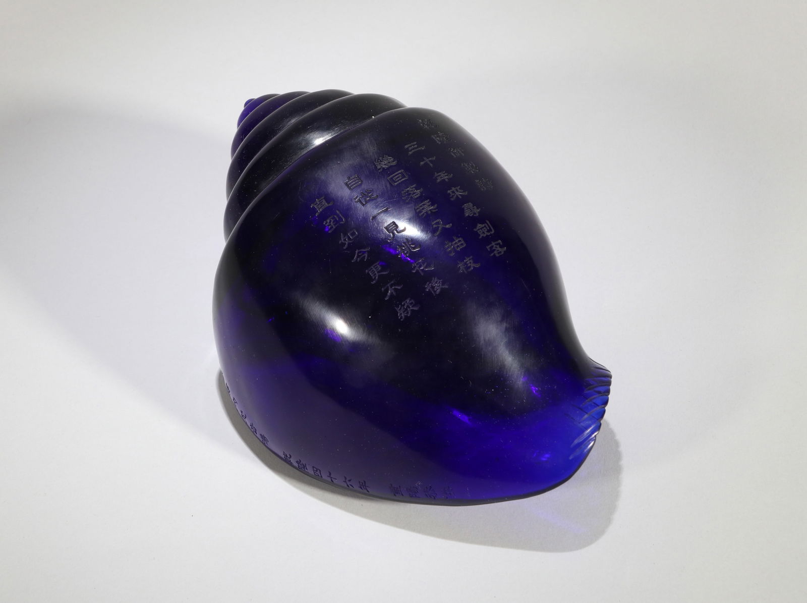 A BLUE GLASS CONCH SHELL - 2