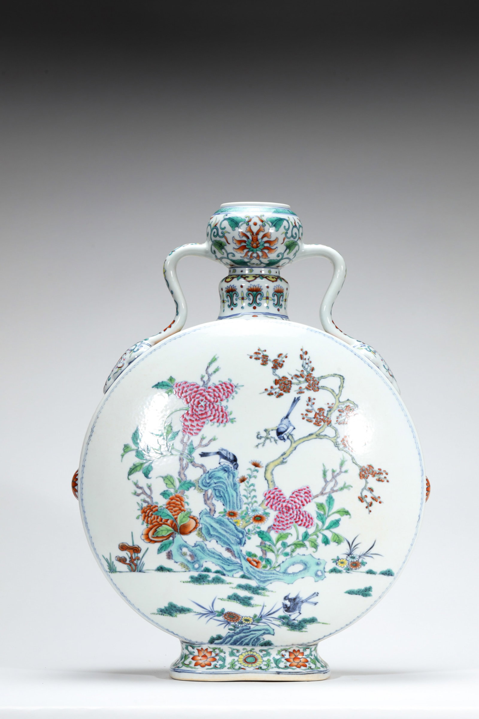 A DOUCAI 'FLOWER AND BIRD' MOON FLASK (1 of 6)