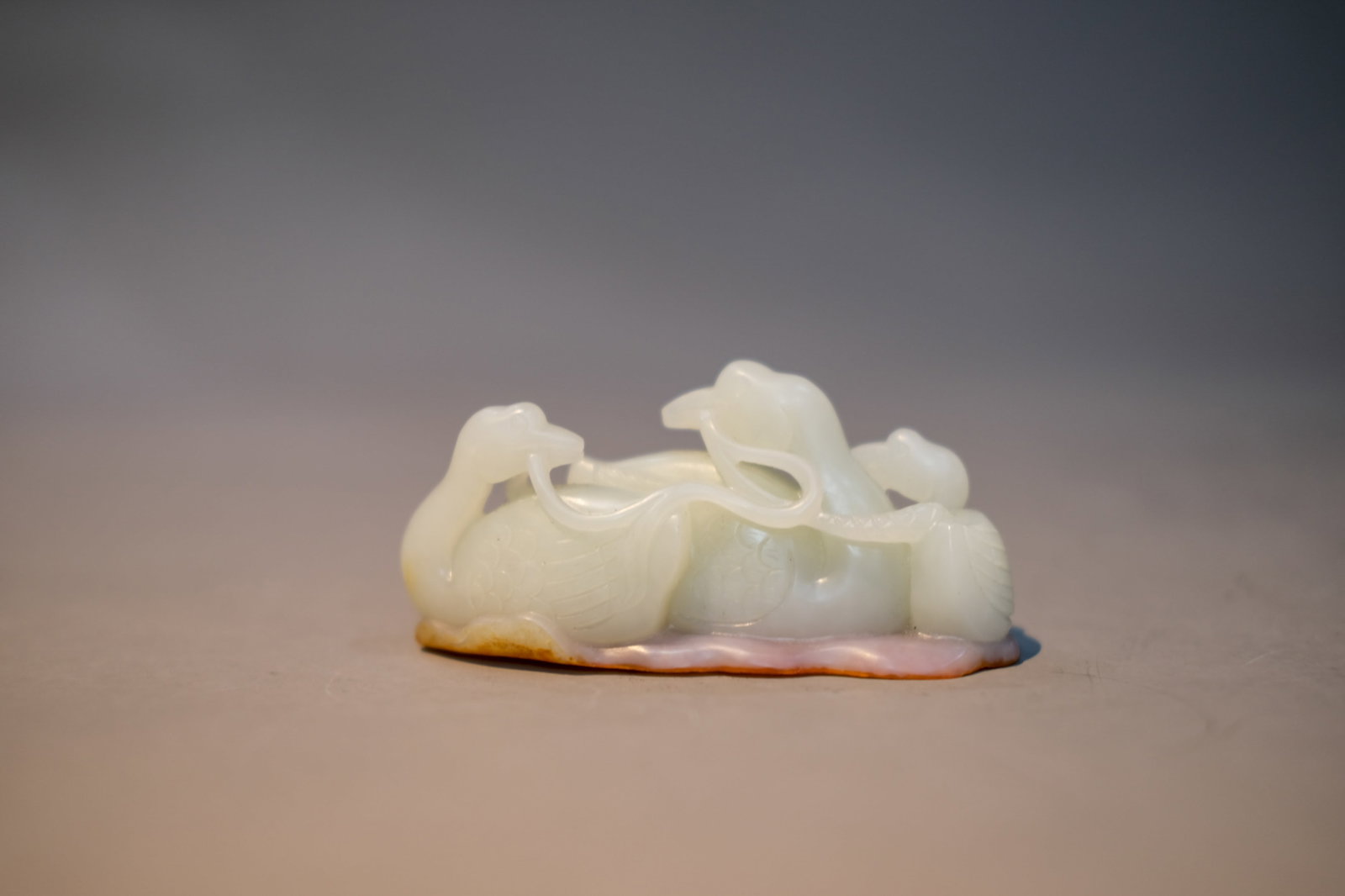 A WHITE JADE 'GOOSE' ORNAMENT (1 of 3)