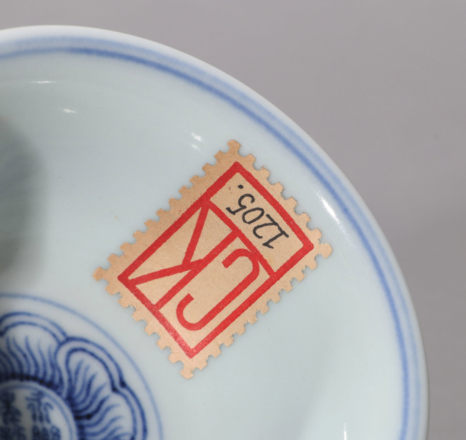 A BLUE AND WHITE CUP - 9