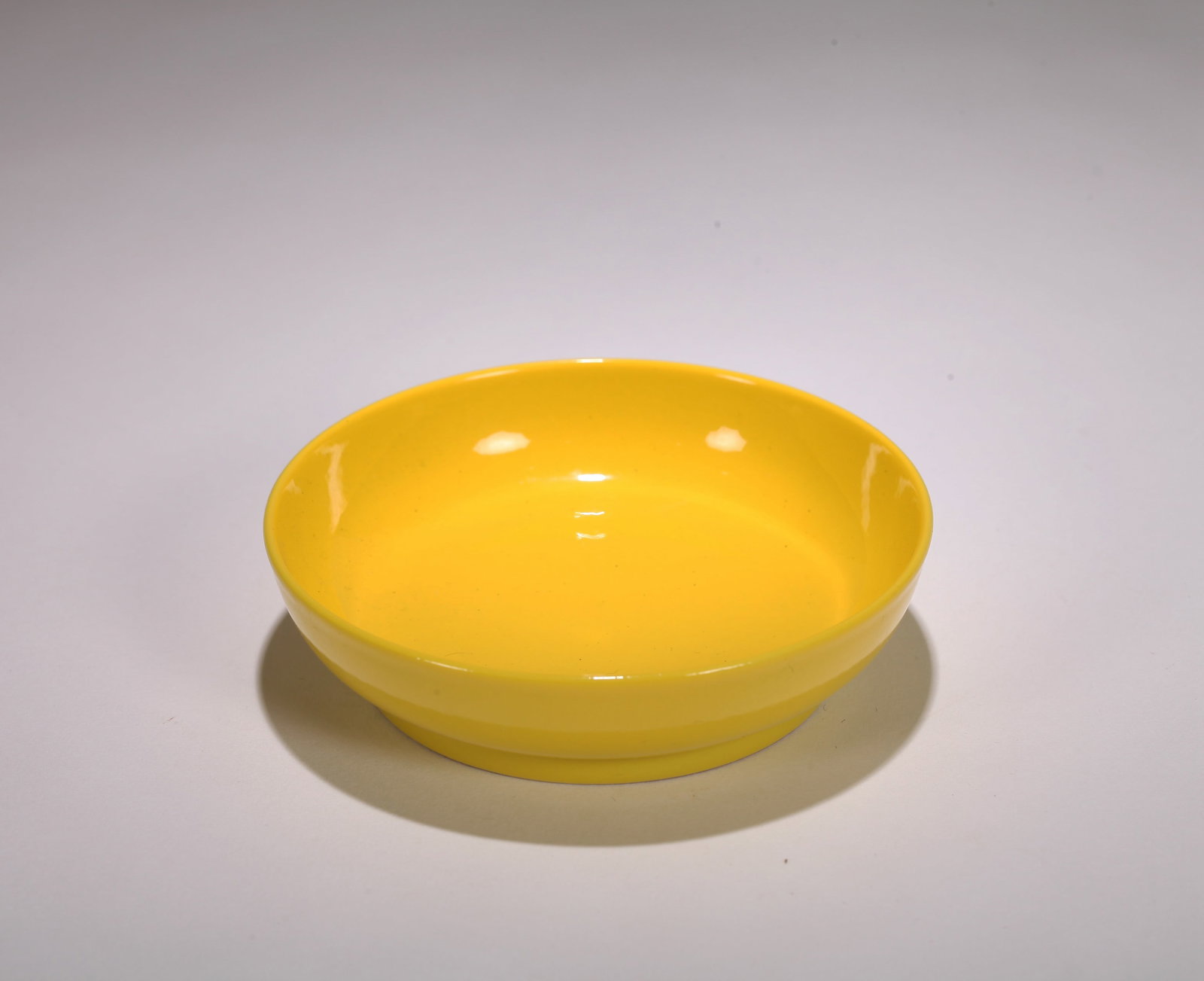 A YELLOW-GLAZED DISH - 2
