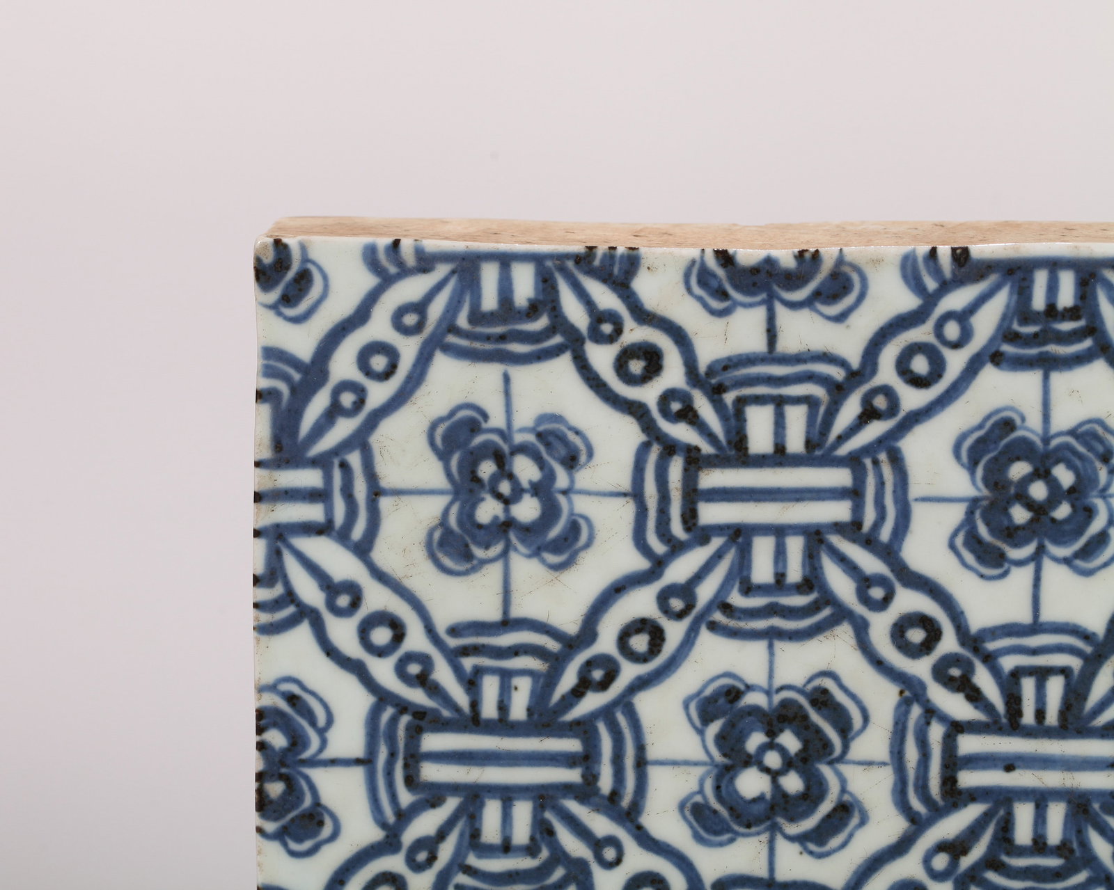 A BLUE AND WHITE TILE - 3