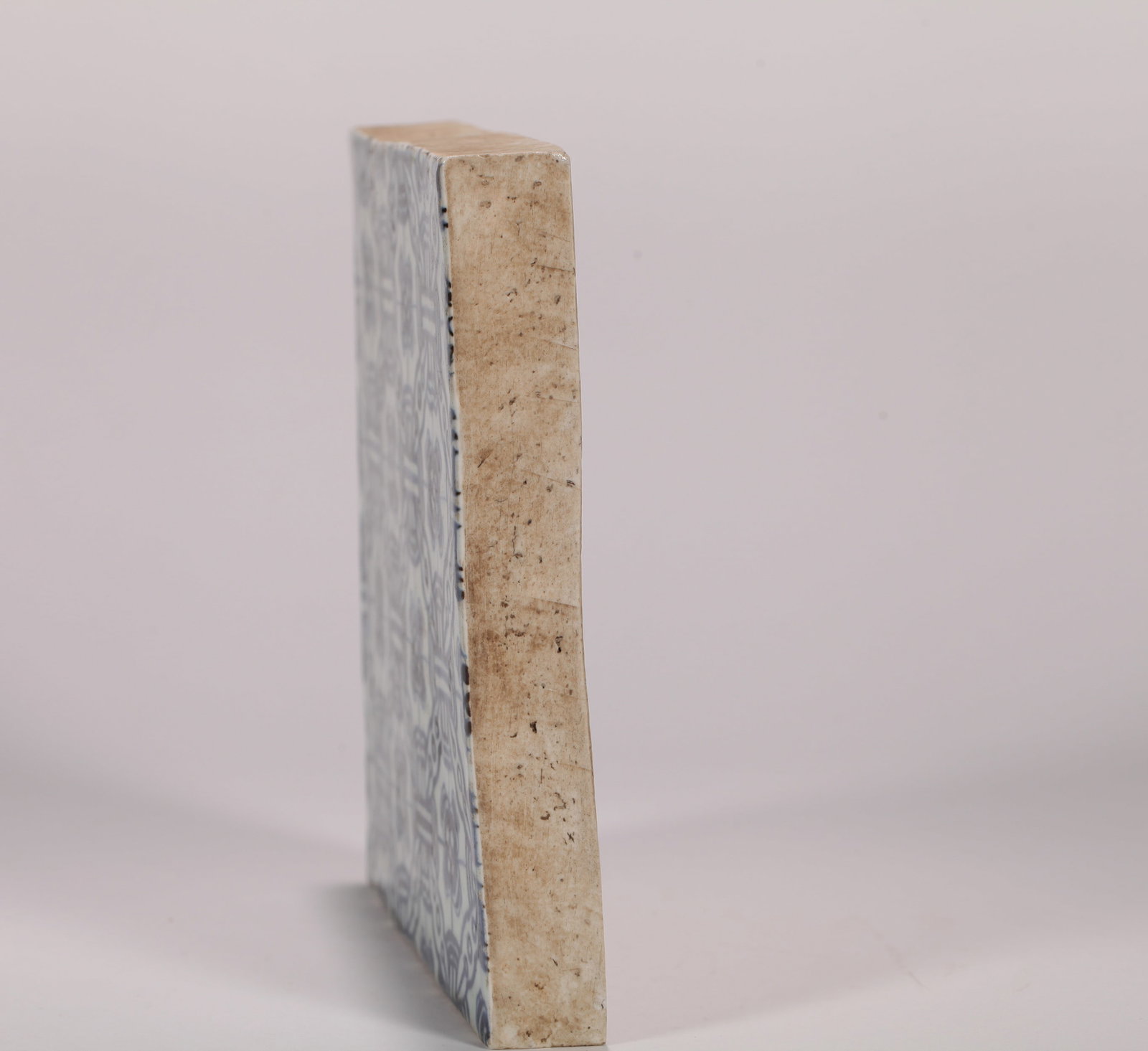 A BLUE AND WHITE TILE - 5