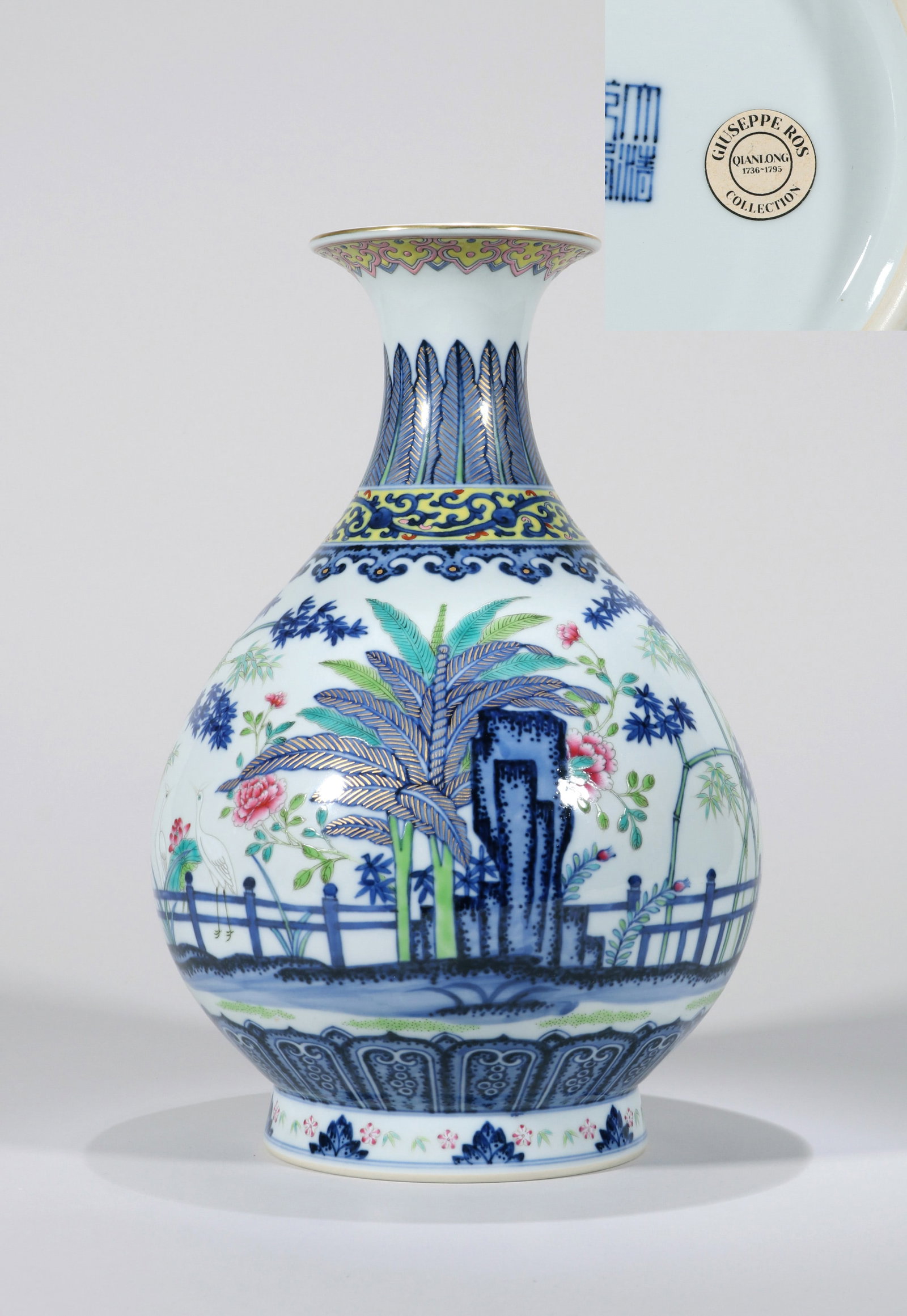A BLUE AND WHITE AND FAMILLE-ROSE VASE: A blue and white and famille-rose Yuhuchun vase decorated with plantains in a courtyard. Height 30 cm. Note: By repute, from the collection of the Italian diplomat Giuseppe Ros.