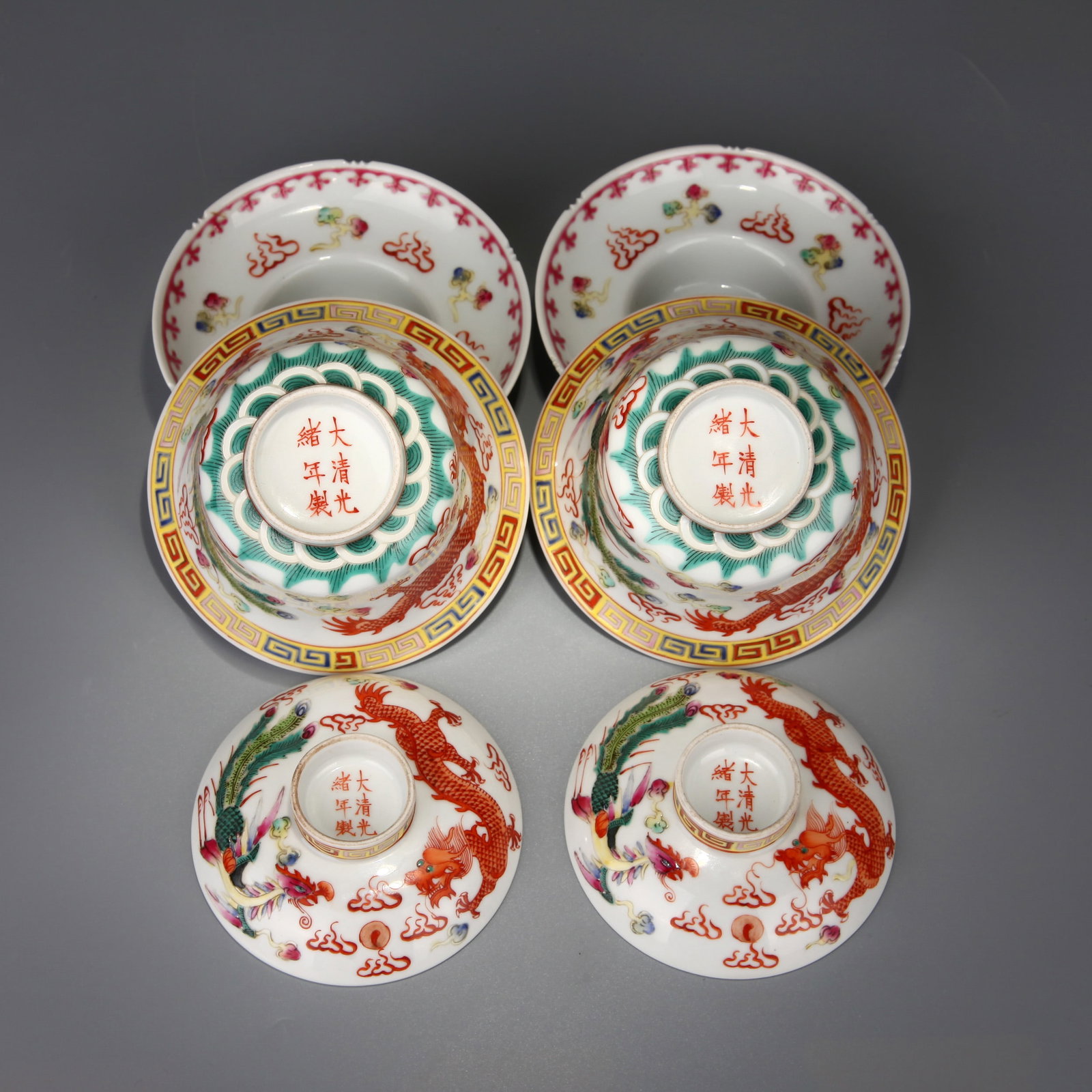 A PAIR OF FAMILLE-ROSE 'DRAGON AND PHOENIX' BOWLS AND COVERS (1 of 11)