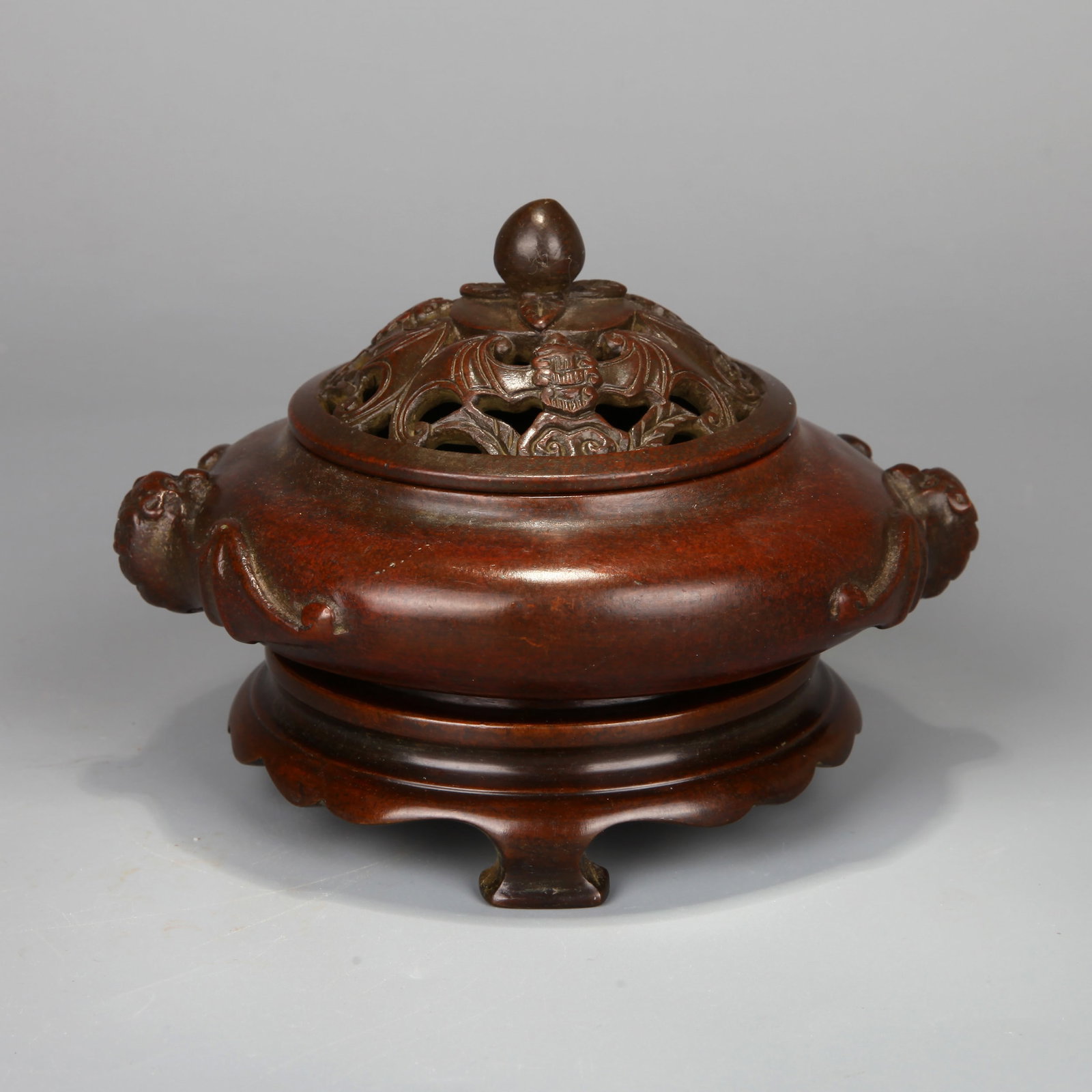 A BRONZE 'LONGEVITY' CENSER: A bronze censer decorated with Five Bats and Longevity design (Wu Fu Peng Shou). With a base. Height 10.5 cm, Width 10.5 cm, Weight 2301 g.