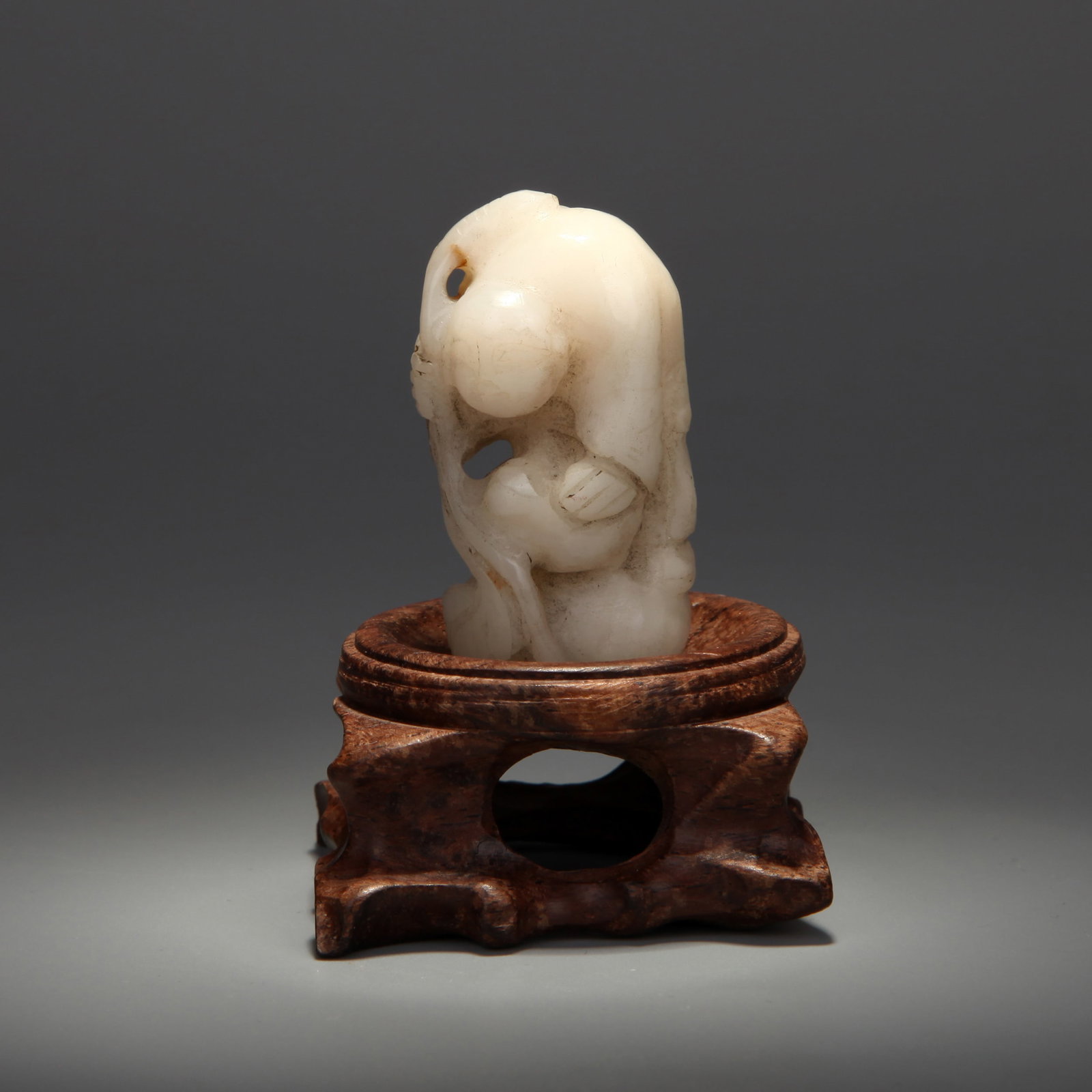 A JADE 'BOY AND LOTUS' PENDANT (1 of 7)