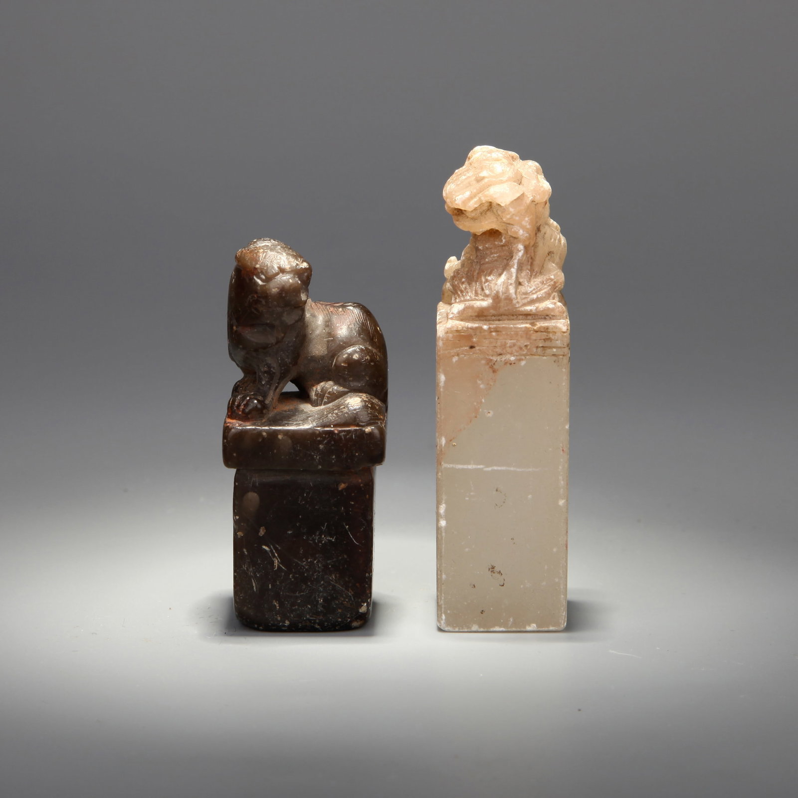 TWO STONE 'LION' SEALS - 2