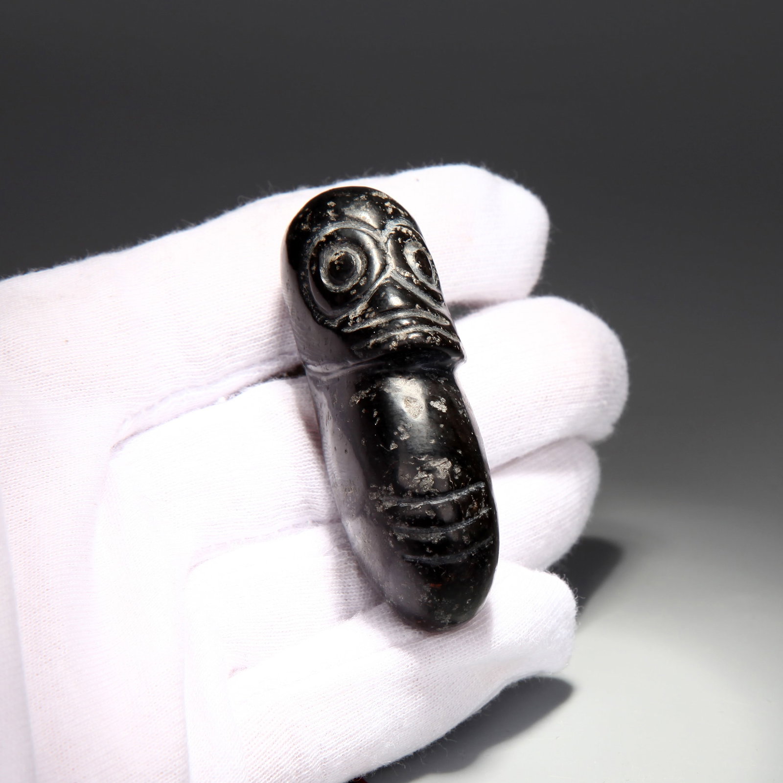 A HETIAN JADE 'SILKWORM' PENDANT (1 of 6)