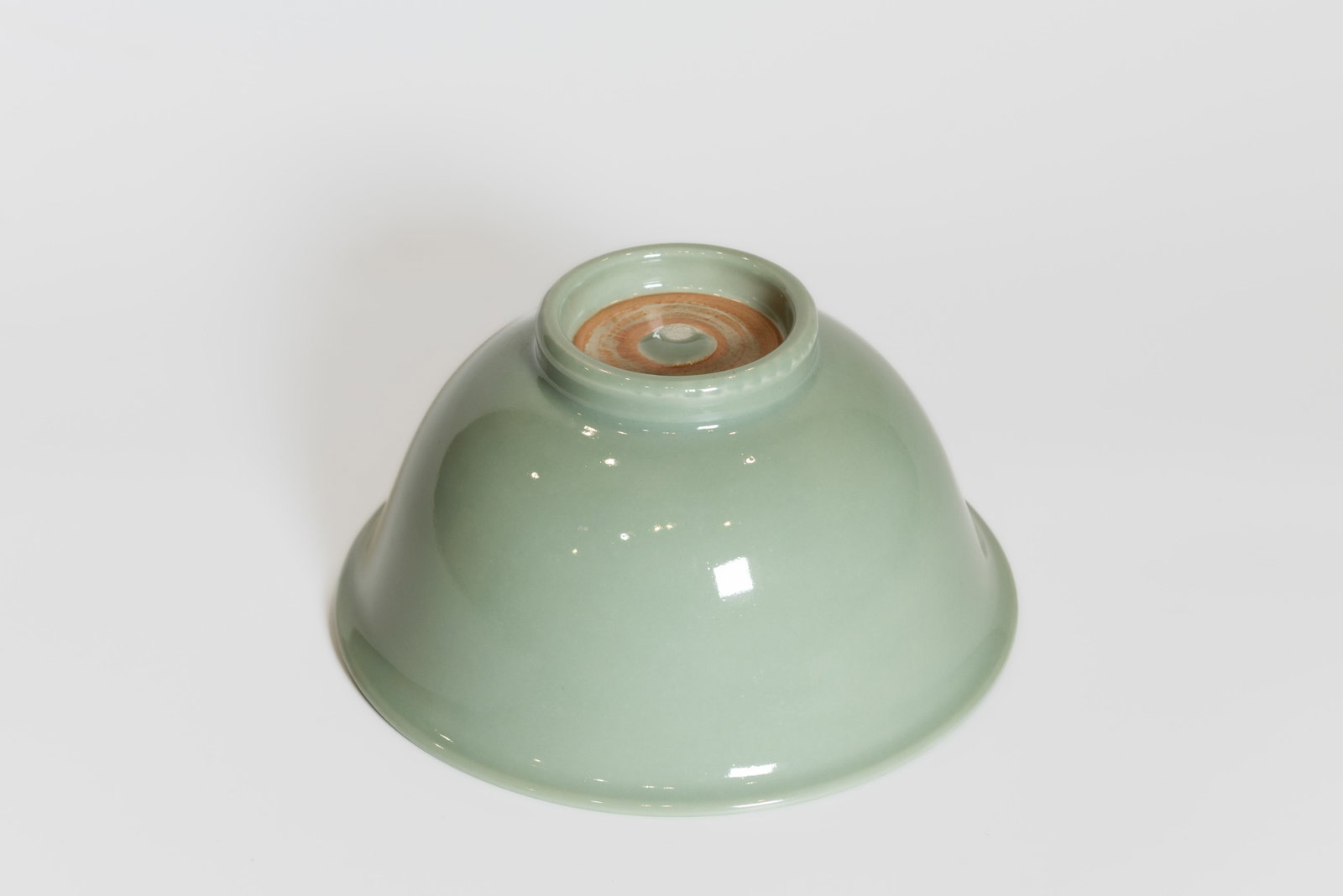 A CELADON-GLAZED PORCELAIN BOWL - 5