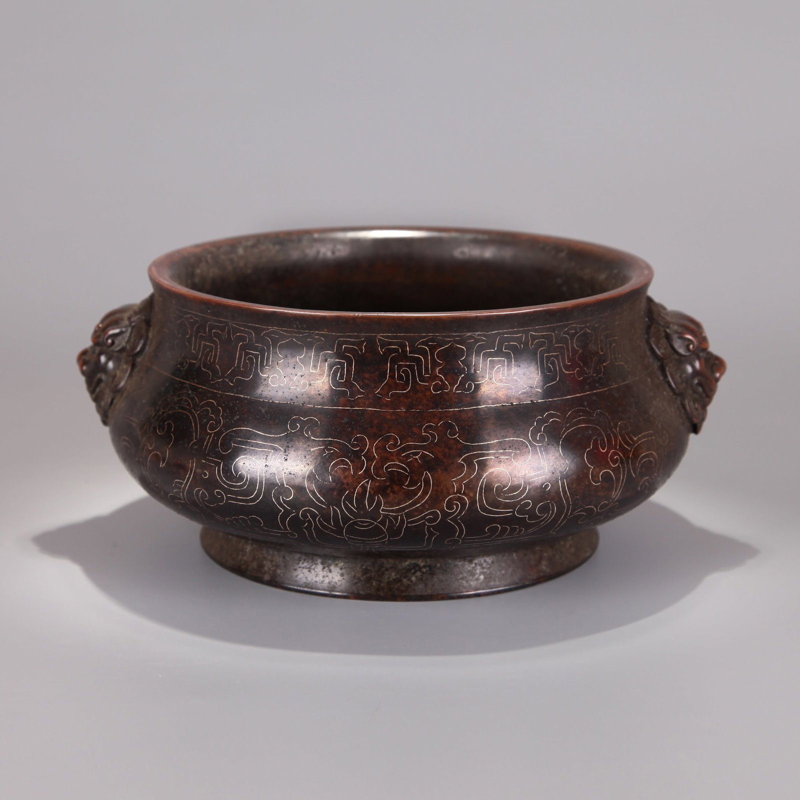 A BRONZE CENSER WITH LION HANDLES (1 of 8)
