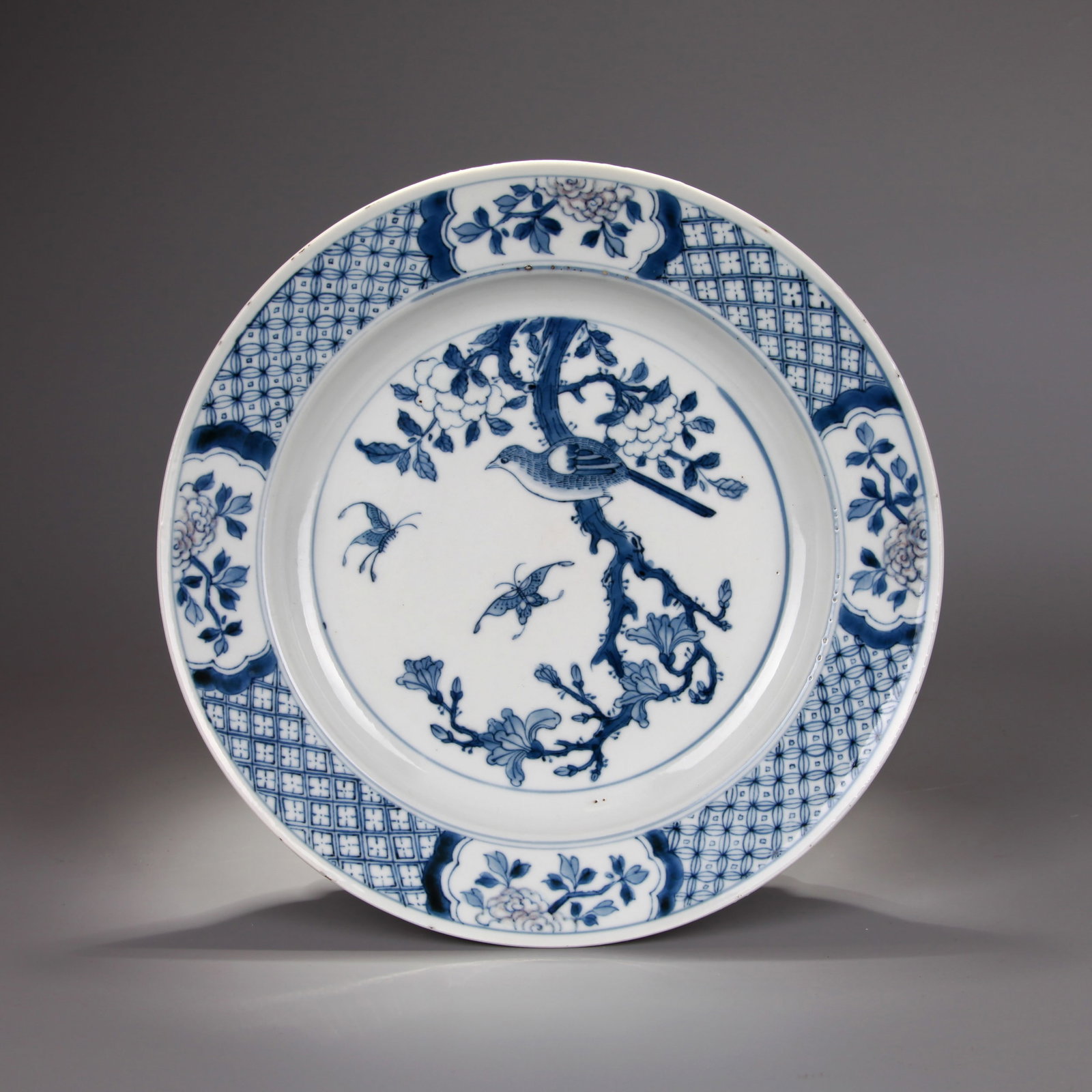 A BLUE AND WHITE 'BIRDS AND FLOWERS' DISH (1 of 7)