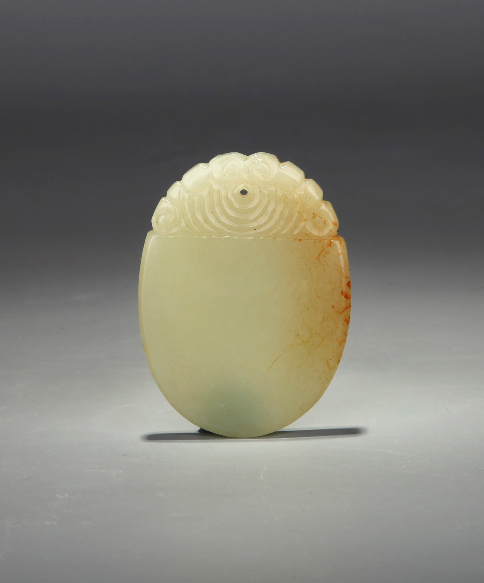 A JADE 'PEACE' PENDANT (1 of 6)