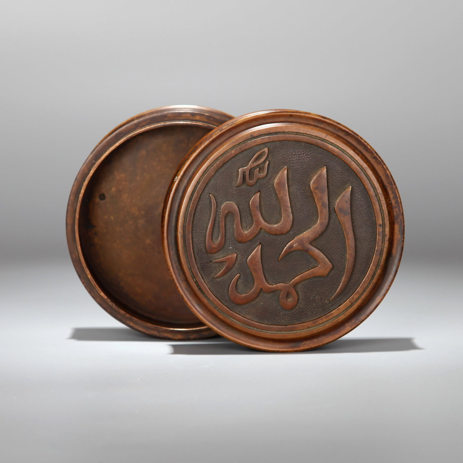 A BRONZE COVERED BOX WITH ARABIC SCRIPT (1 of 7)