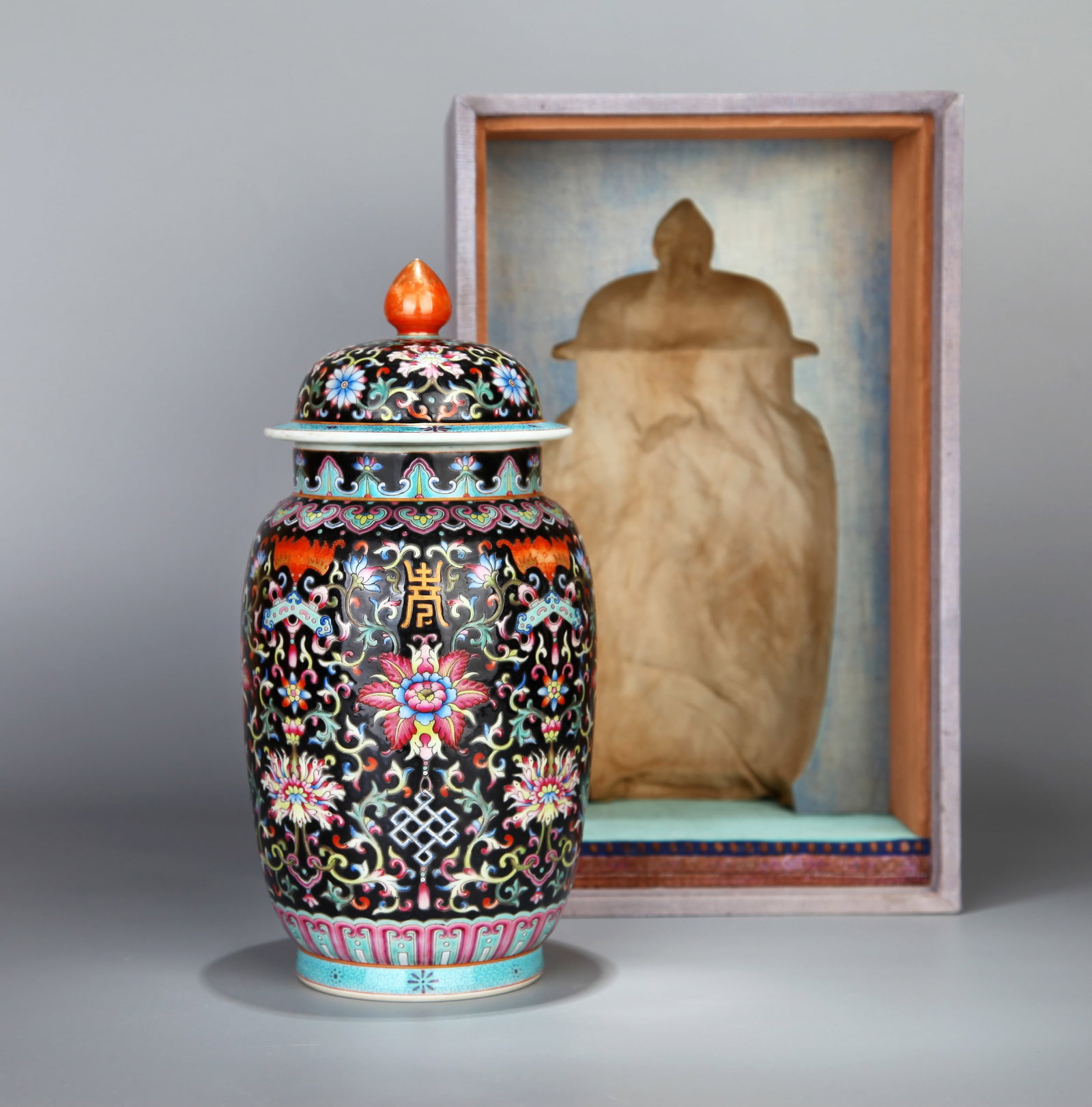 A BLACK-GROUND FAMILLE ROSE 'FLORAL' JAR (ZHUANGGUAN) (1 of 9)