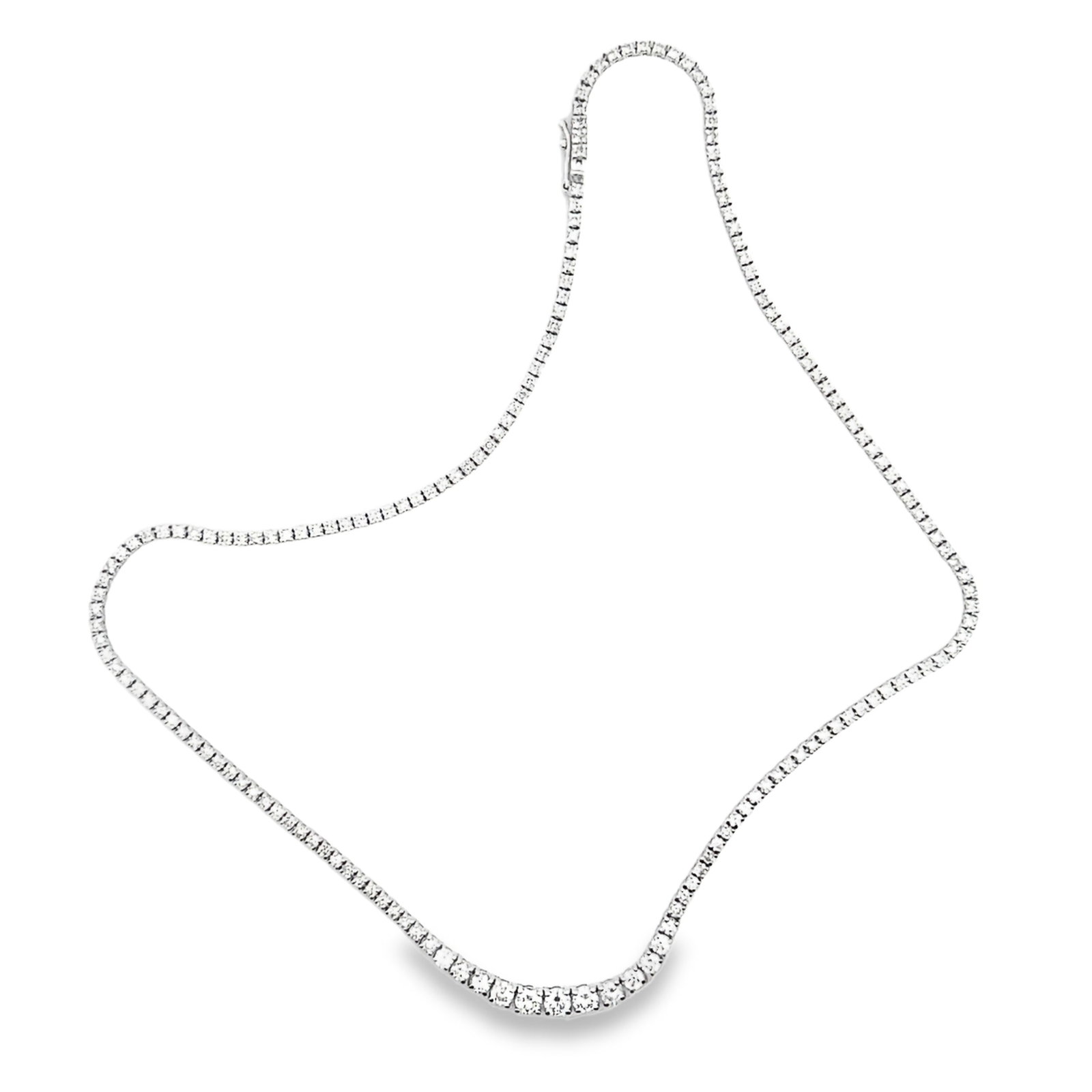 DIAMOND AND 18K WHITE GOLD NECKLACE: Graduated diamond and 18K white gold tennis necklace. 16.54"l (42 cm); 15.8 grams