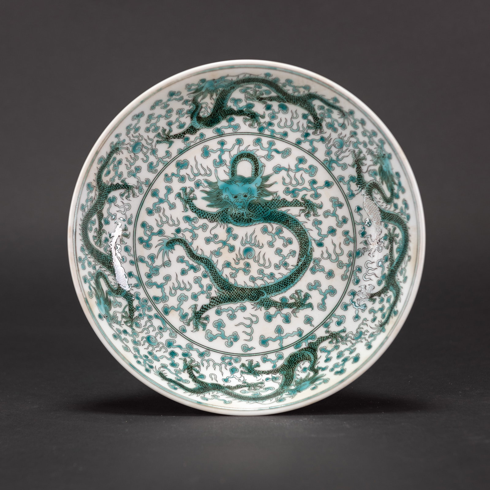 A TURQUOISE-ENAMELED "DRAGON" DISH, YONGZHENG MARK: A turquoise-enameled "dragon" dish, Yongzheng mark. 21 x 4.8 cm