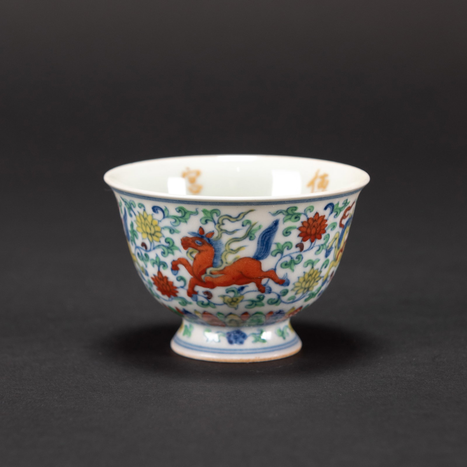 A DOUCAI CUP, CHENGHUA MARK: A doucai cup, Chenghua mark. H5.5 x 8 cm