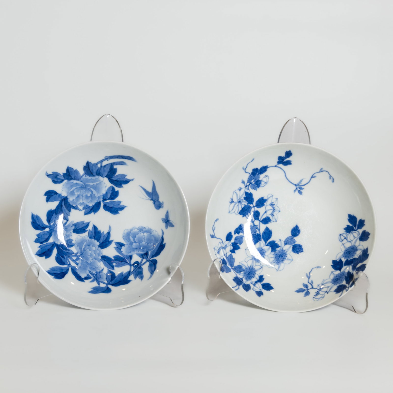 GROUP OF TWO JAPANESE BLUE AND WHITE DISHES: (lot of 2) A group of Japanese blue and white dishes. Each: 6.5 x 21 cm Provenance: Private collection of the Smith family, Santa Monica, California, by descent.