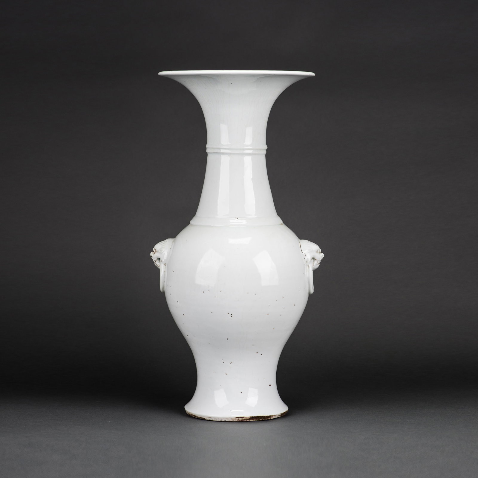 A CHINESE WHITE-GLAZED BALUSTER VASE (1 of 5)