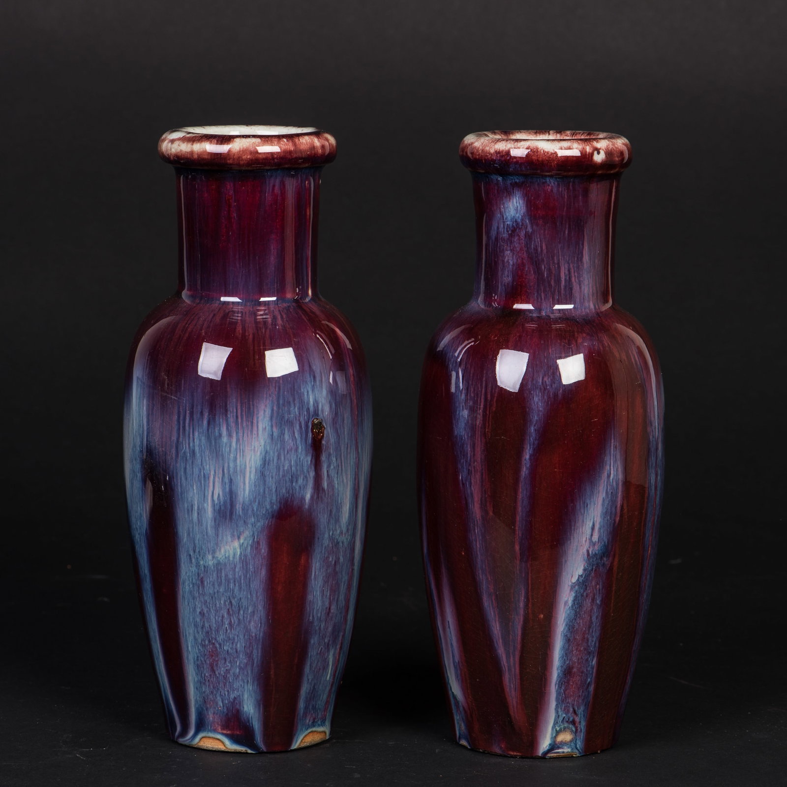 A PAIR OF RED GLAZED VASES (1 of 4)